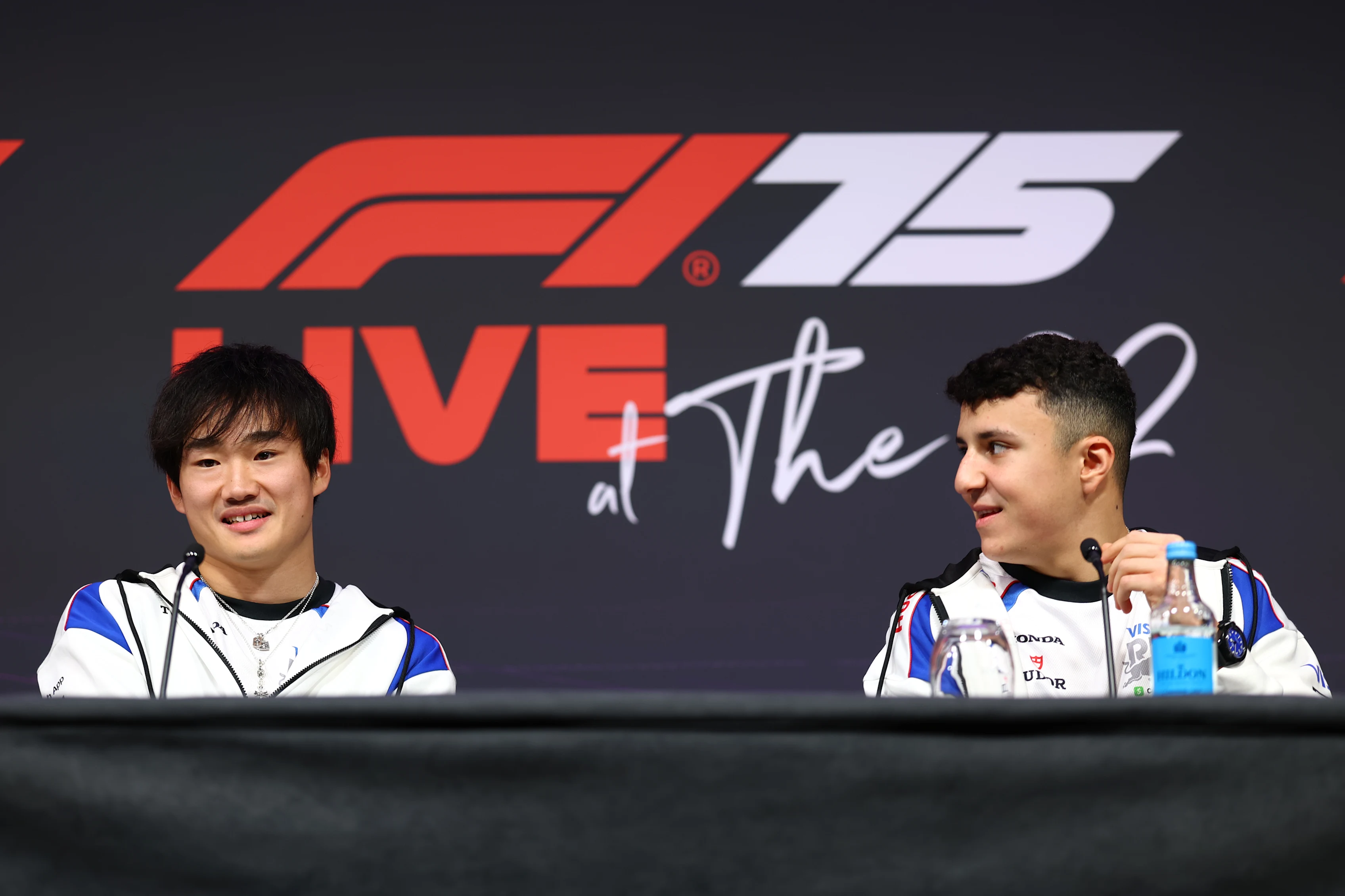 Yuki Tsunoda and Isack Hadjar talk to the media during a press conference prior to F1 75 Live at InterContinental London O2 on February 18, 2025 in London, England. (Photo by Clive Rose - Formula 1/Formula 1 via Getty Images)