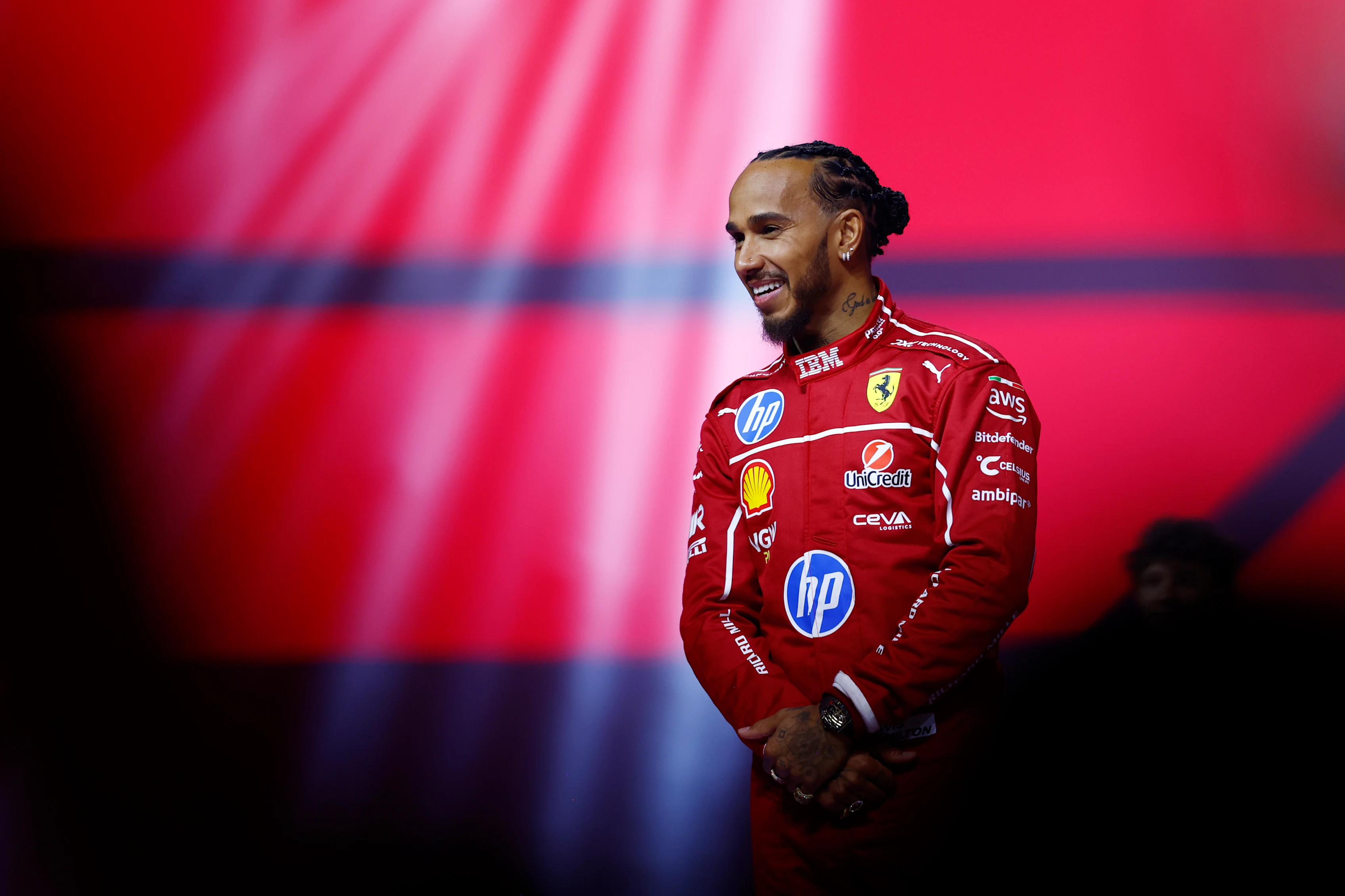 LONDON, ENGLAND - FEBRUARY 18: Lewis Hamilton of Great Britain and Scuderia Ferrari looks on during