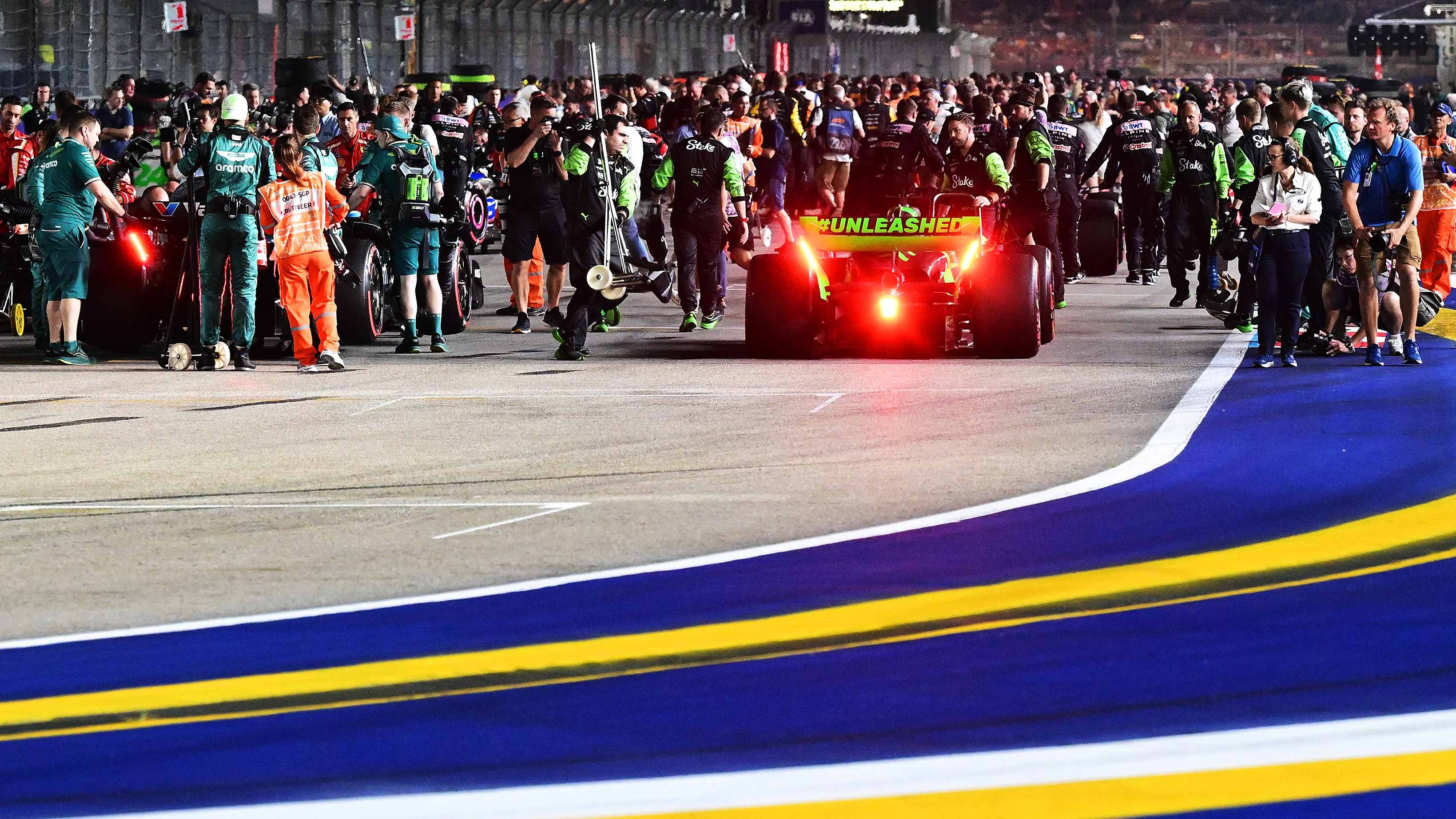 SINGAPORE, SINGAPORE - SEPTEMBER 22: Valtteri Bottas of Finland driving the (77) Kick Sauber C44 Ferrari arrives on the grid prior to the F1 Grand Prix of Singapore at Marina Bay Street Circuit on September 22, 2024 in Singapore, Singapore. (Photo by Pauline Ballet - Formula 1/Formula 1 via Getty Images)