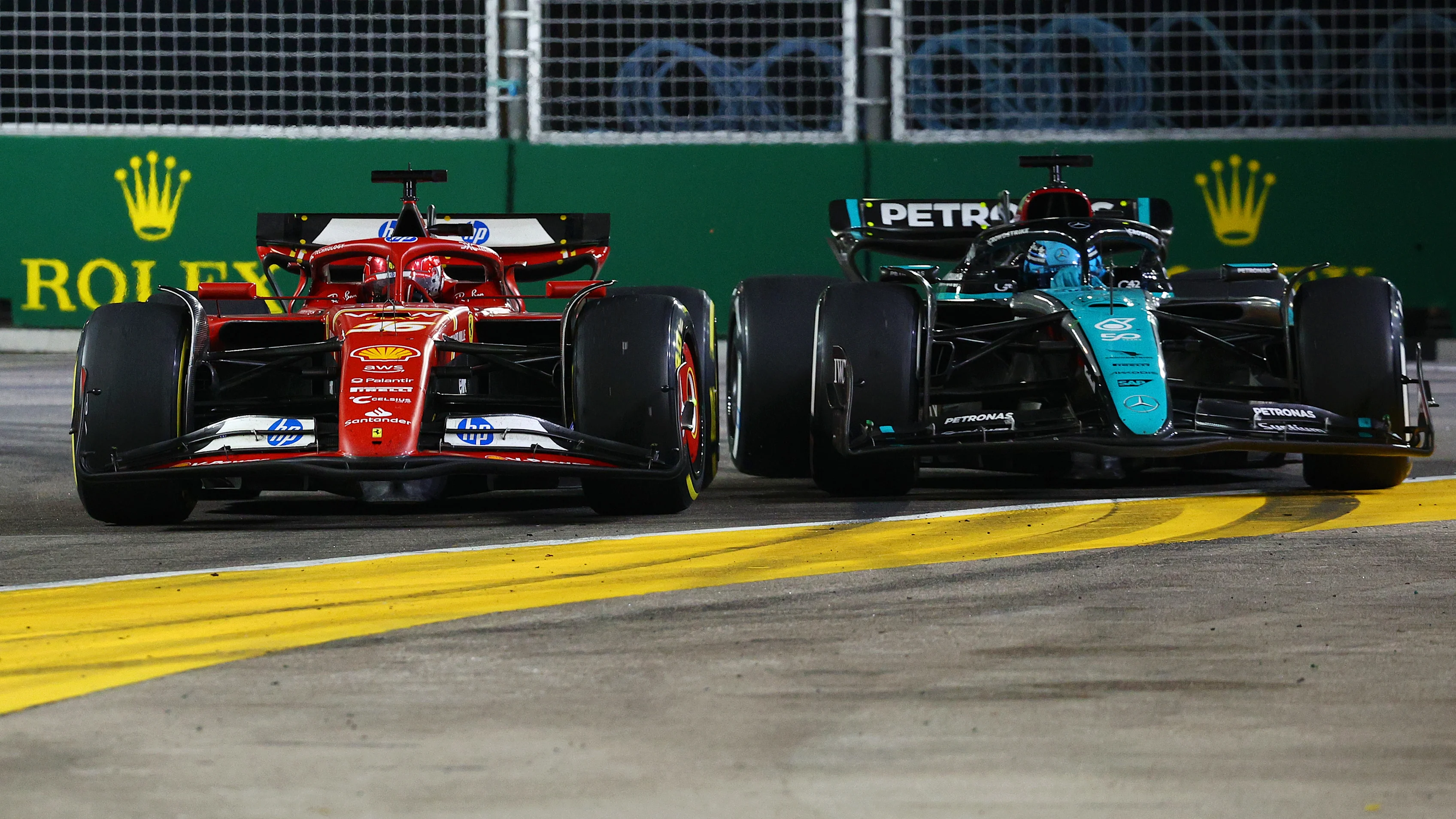 SINGAPORE, SINGAPORE - SEPTEMBER 22: Charles Leclerc of Monaco driving the (16) Ferrari SF-24 and