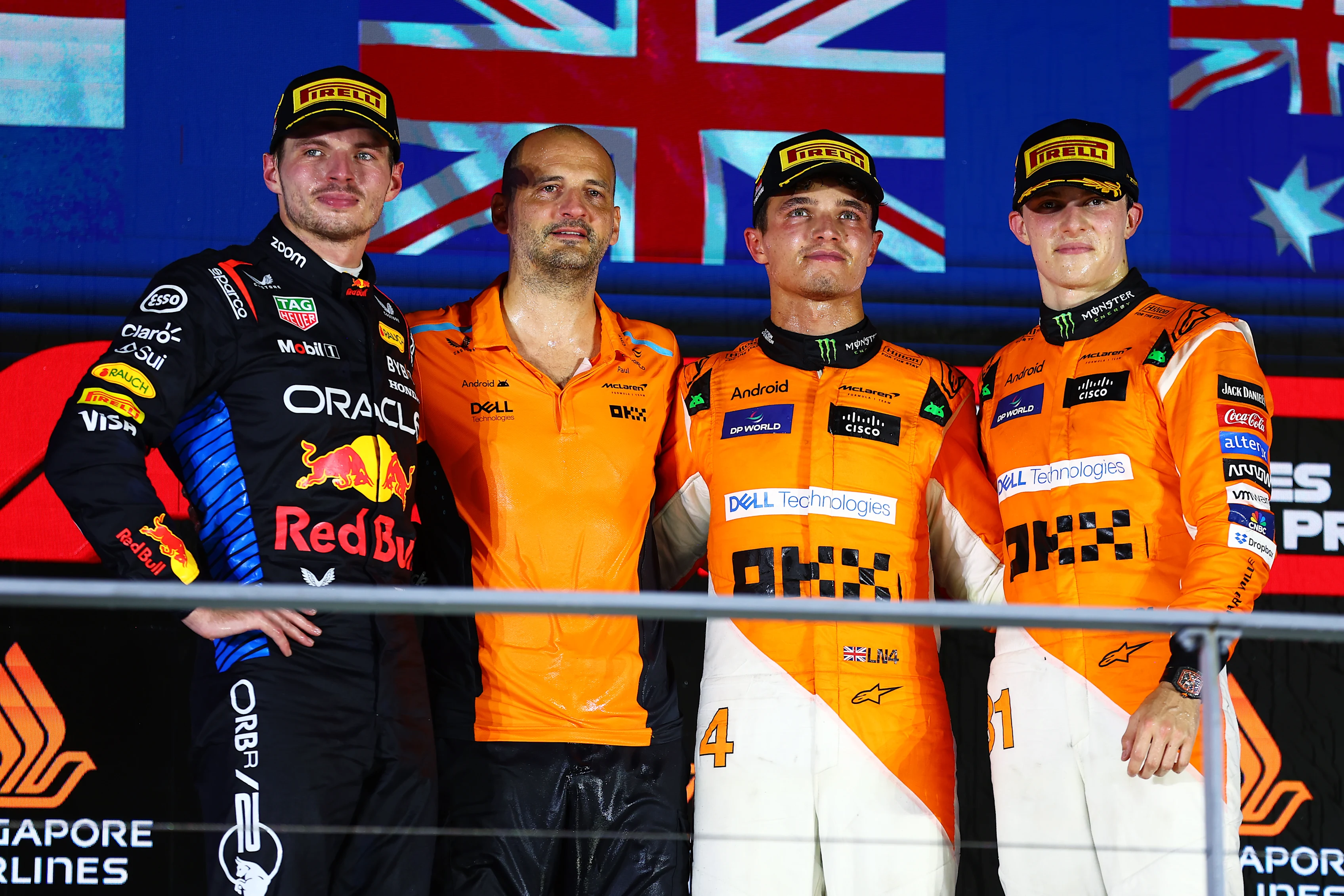 SINGAPORE, SINGAPORE - SEPTEMBER 22: Race winner Lando Norris of Great Britain and McLaren, Second