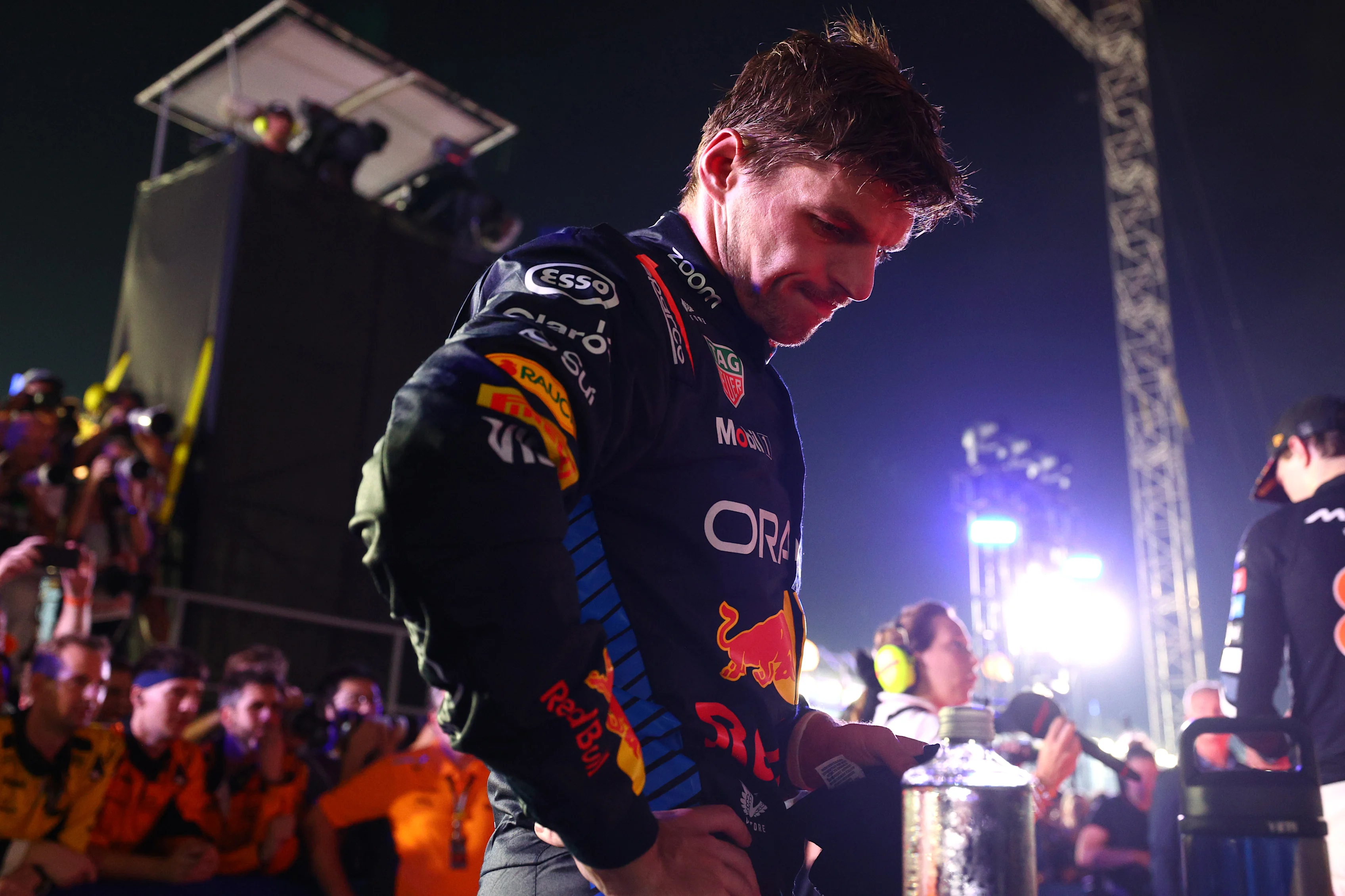 SINGAPORE, SINGAPORE - SEPTEMBER 22: Second placed Max Verstappen of the Netherlands and Oracle Red Bull Racing looks on in parc ferme during the F1 Grand Prix of Singapore at Marina Bay Street Circuit on September 22, 2024 in Singapore, Singapore. (Photo by Clive Rose - Formula 1/Formula 1 via Getty Images)