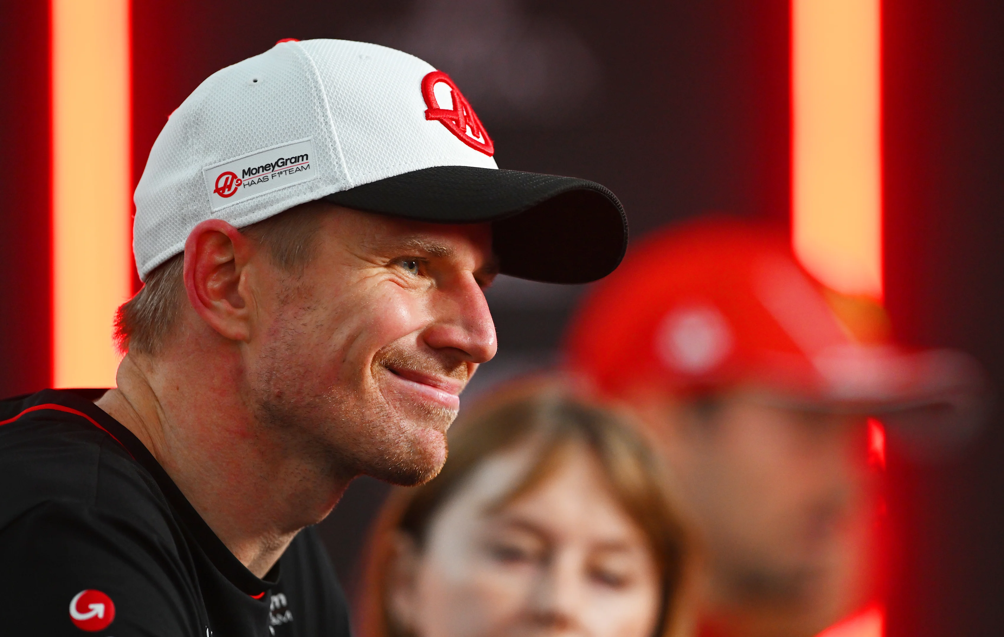 SINGAPORE, SINGAPORE - SEPTEMBER 22: 9th placed Nico Hulkenberg of Germany and Haas F1 speaks to