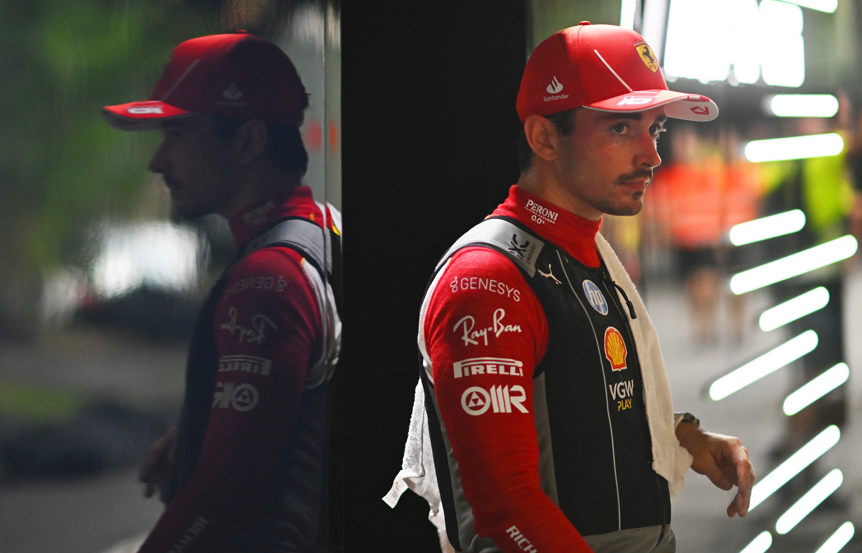 SINGAPORE, SINGAPORE - SEPTEMBER 22: 5th placed Charles Leclerc of Monaco and Ferrari looks on in the Paddock after the F1 Grand Prix of Singapore at Marina Bay Street Circuit on September 22, 2024. (Photo by Rudy Carezzevoli/Getty Images)