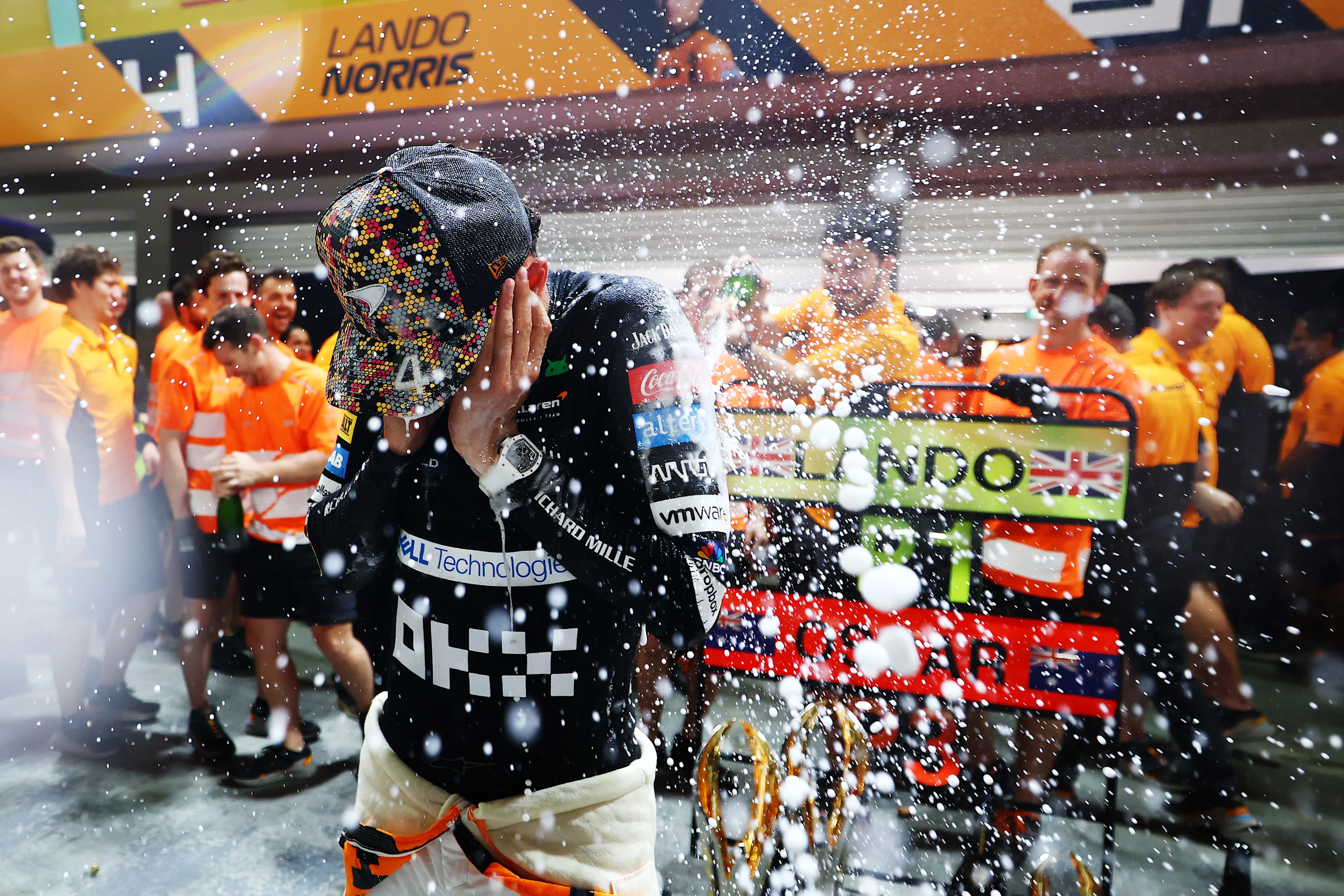 SINGAPORE, SINGAPORE - SEPTEMBER 22: Race winner Lando Norris of Great Britain and McLaren