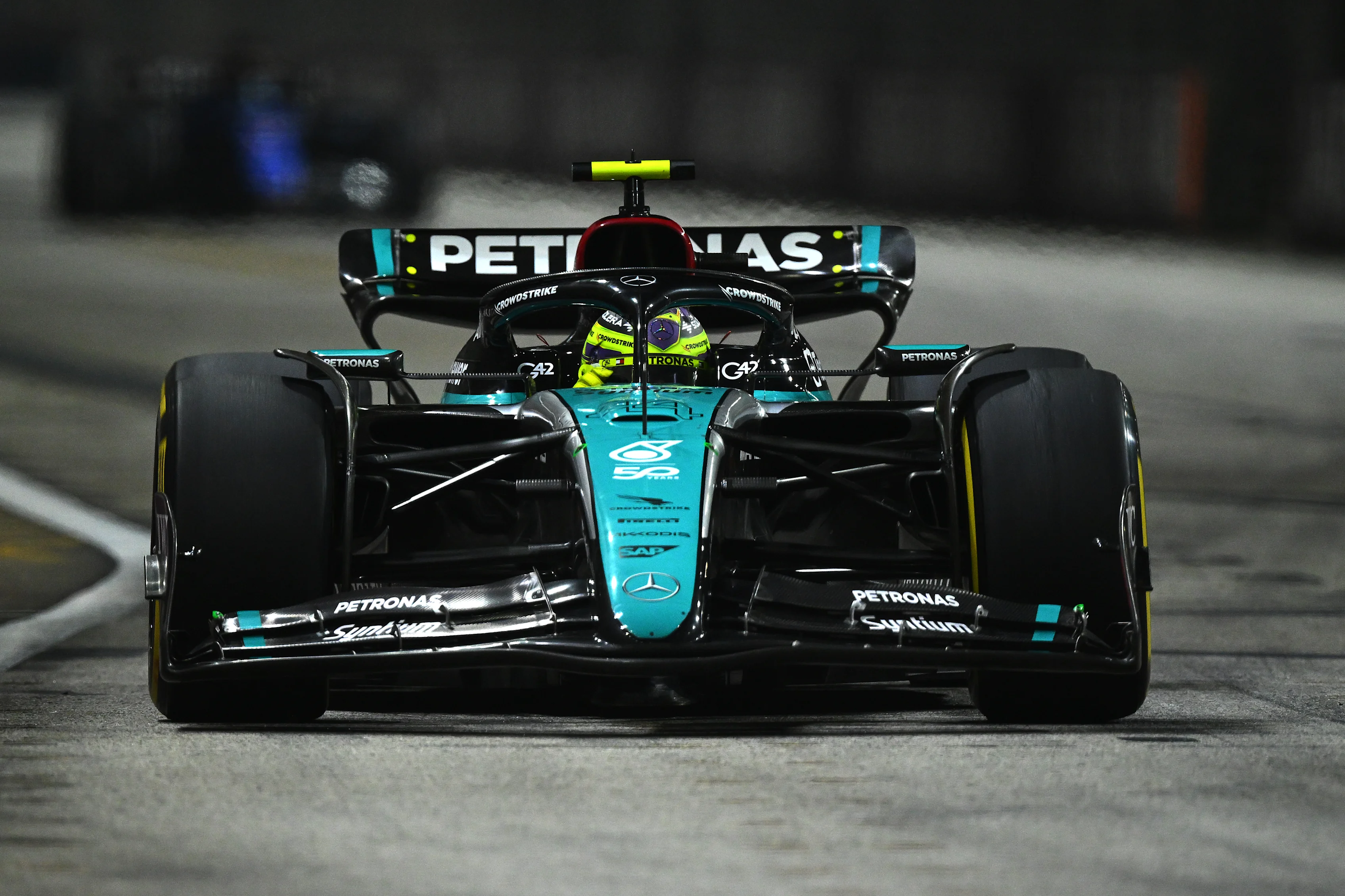 SINGAPORE, SINGAPORE - SEPTEMBER 20: Lewis Hamilton of Great Britain driving the (44) Mercedes AMG Petronas F1 Team W15 on track during practice ahead of the F1 Grand Prix of Singapore at Marina Bay Street Circuit. (Photo by Clive Mason/Getty Images)