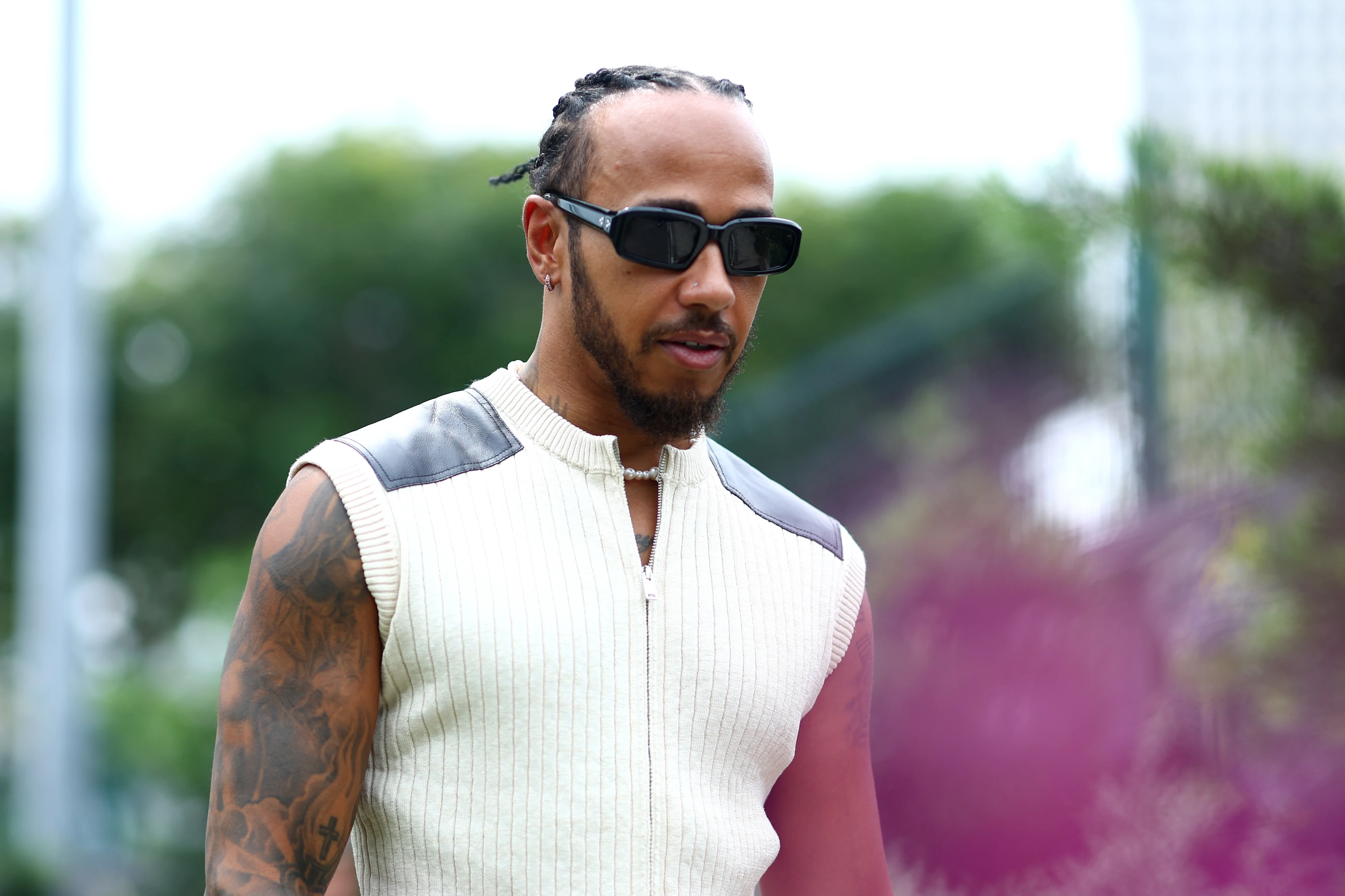 SINGAPORE, SINGAPORE - SEPTEMBER 21: Lewis Hamilton of Great Britain and Mercedes walks in the Paddock prior to final practice ahead of the F1 Grand Prix of Singapore. (Photo by Clive Rose - Formula 1/Formula 1 via Getty Images)