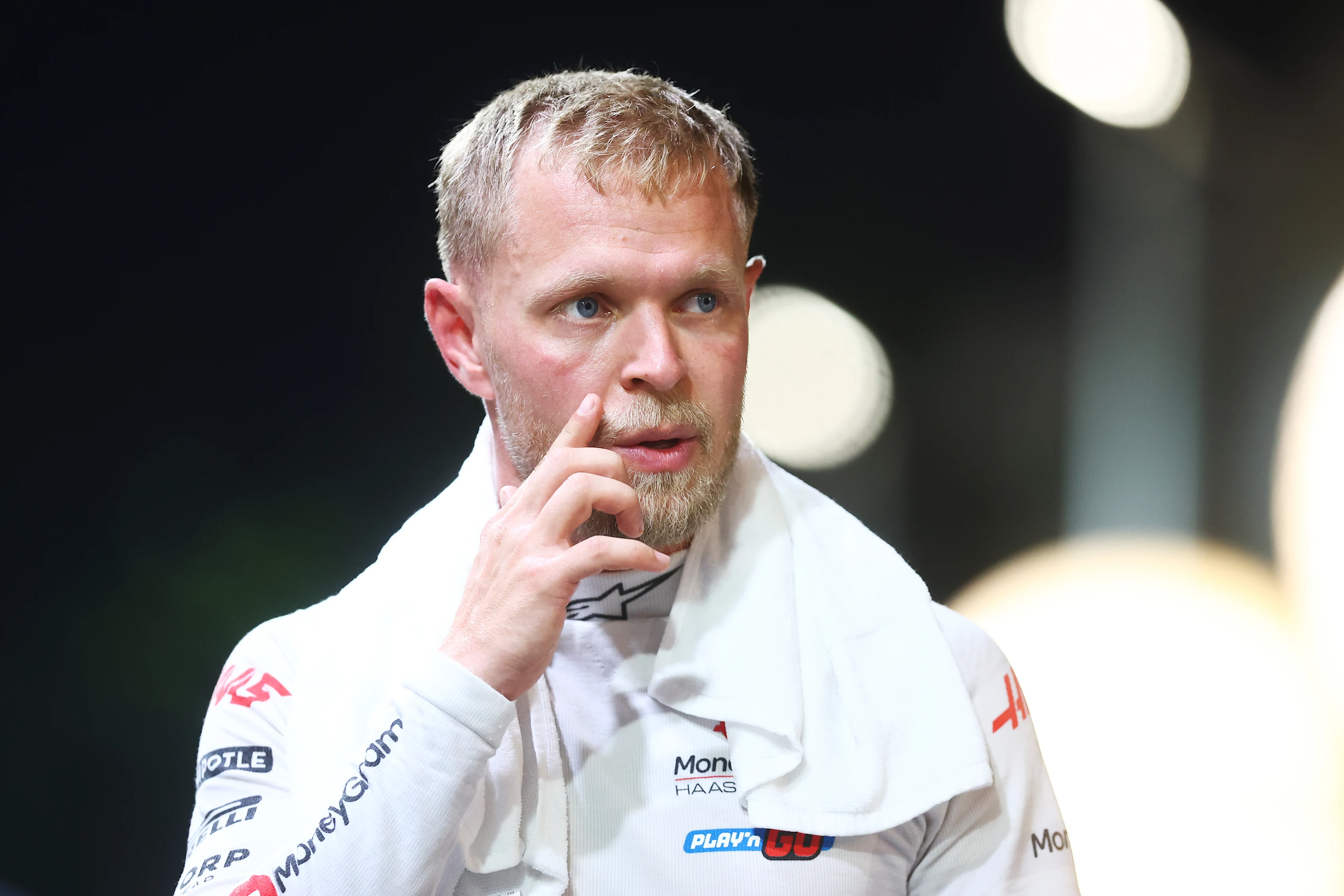 SINGAPORE, SINGAPORE - SEPTEMBER 21: 14th placed qualifier Kevin Magnussen of Denmark and Haas F1 walks in the Paddock during qualifying ahead of the F1 Grand Prix of Singapore. (Photo by Lars Baron - Formula 1/Formula 1 via Getty Images)