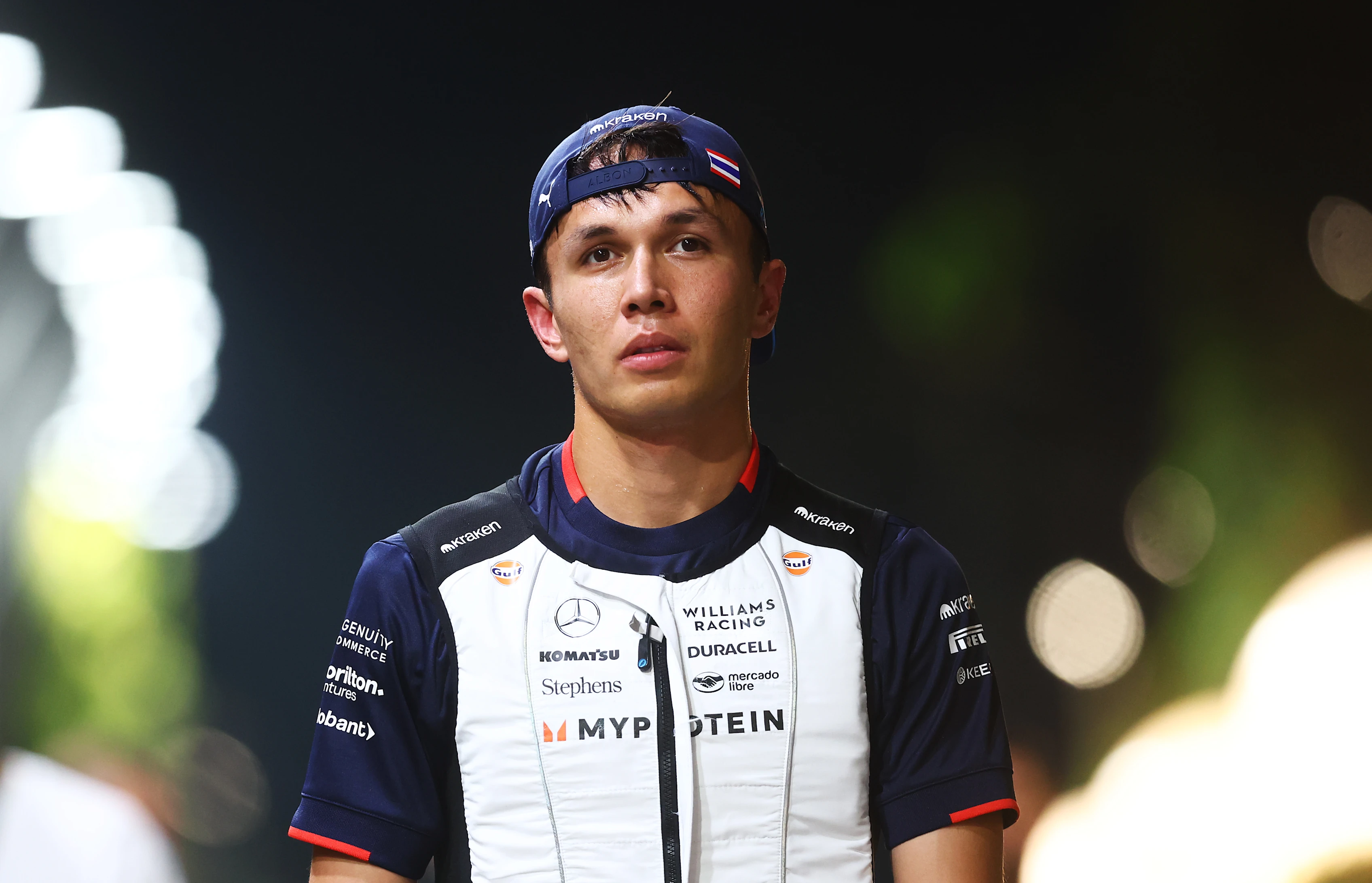 SINGAPORE, SINGAPORE - SEPTEMBER 21: 11th placed qualifier Alexander Albon of Thailand and Williams