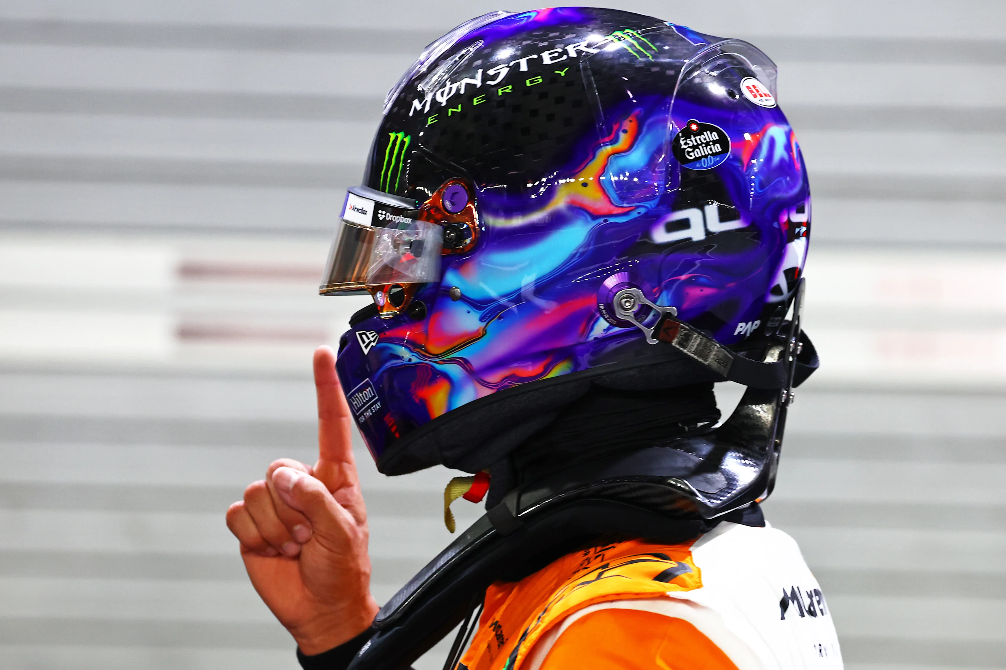 SINGAPORE, SINGAPORE - SEPTEMBER 21: Pole position qualifier Lando Norris of Great Britain and McLaren celebrates in parc ferme during qualifying ahead of the F1 Grand Prix of Singapore at Marina Bay Street Circuit on September 21, 2024 in Singapore, Singapore. (Photo by Mark Thompson/Getty Images)