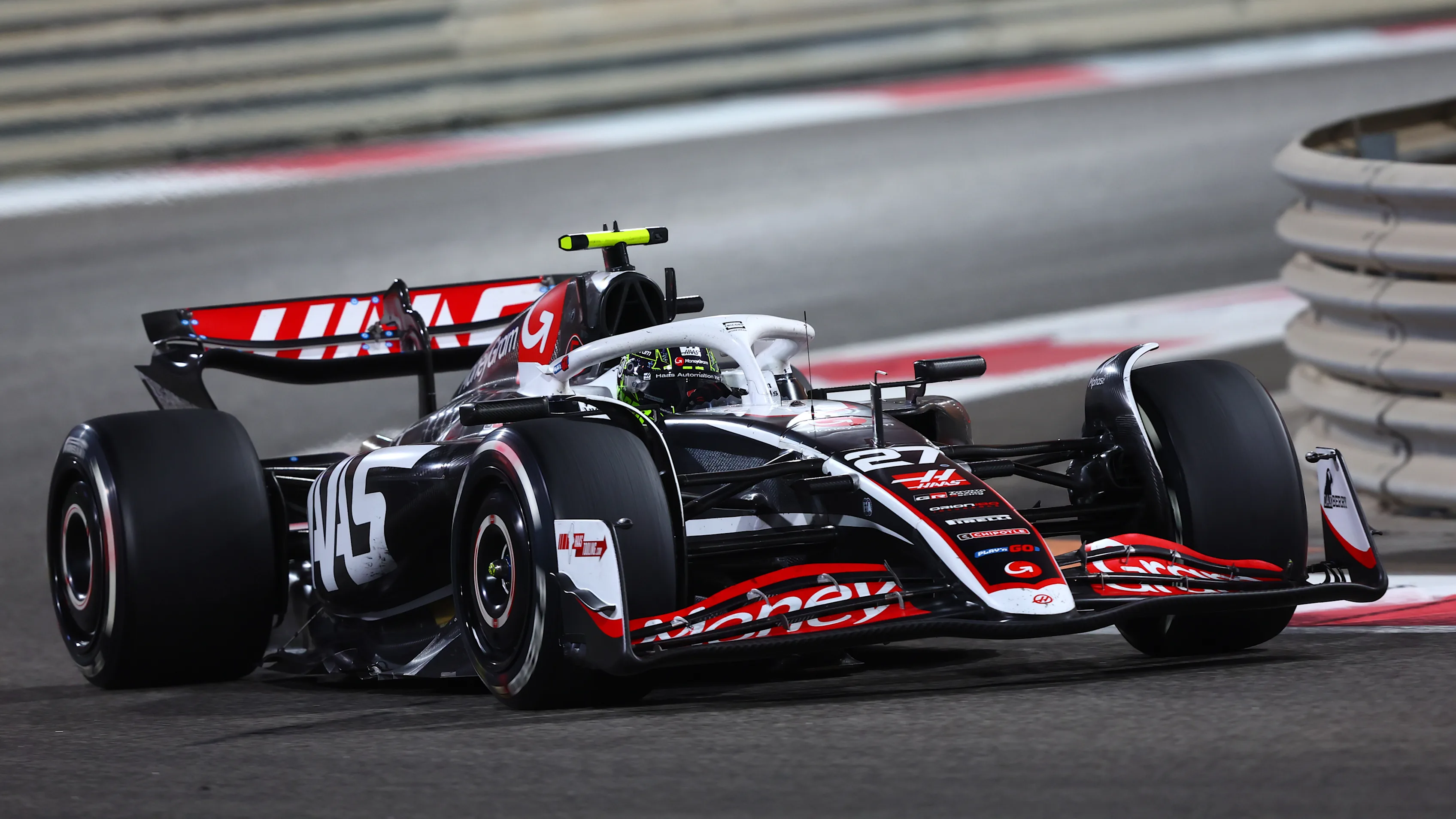 ABU DHABI, UNITED ARAB EMIRATES - DECEMBER 08: Nico Hulkenberg of Germany driving the (27) Haas F1 VF-24 Ferrari on track during the F1 Grand Prix of Abu Dhabi at Yas Marina Circuit on December 08, 2024 in Abu Dhabi, United Arab Emirates. (Photo by Joe Portlock/Getty Images)