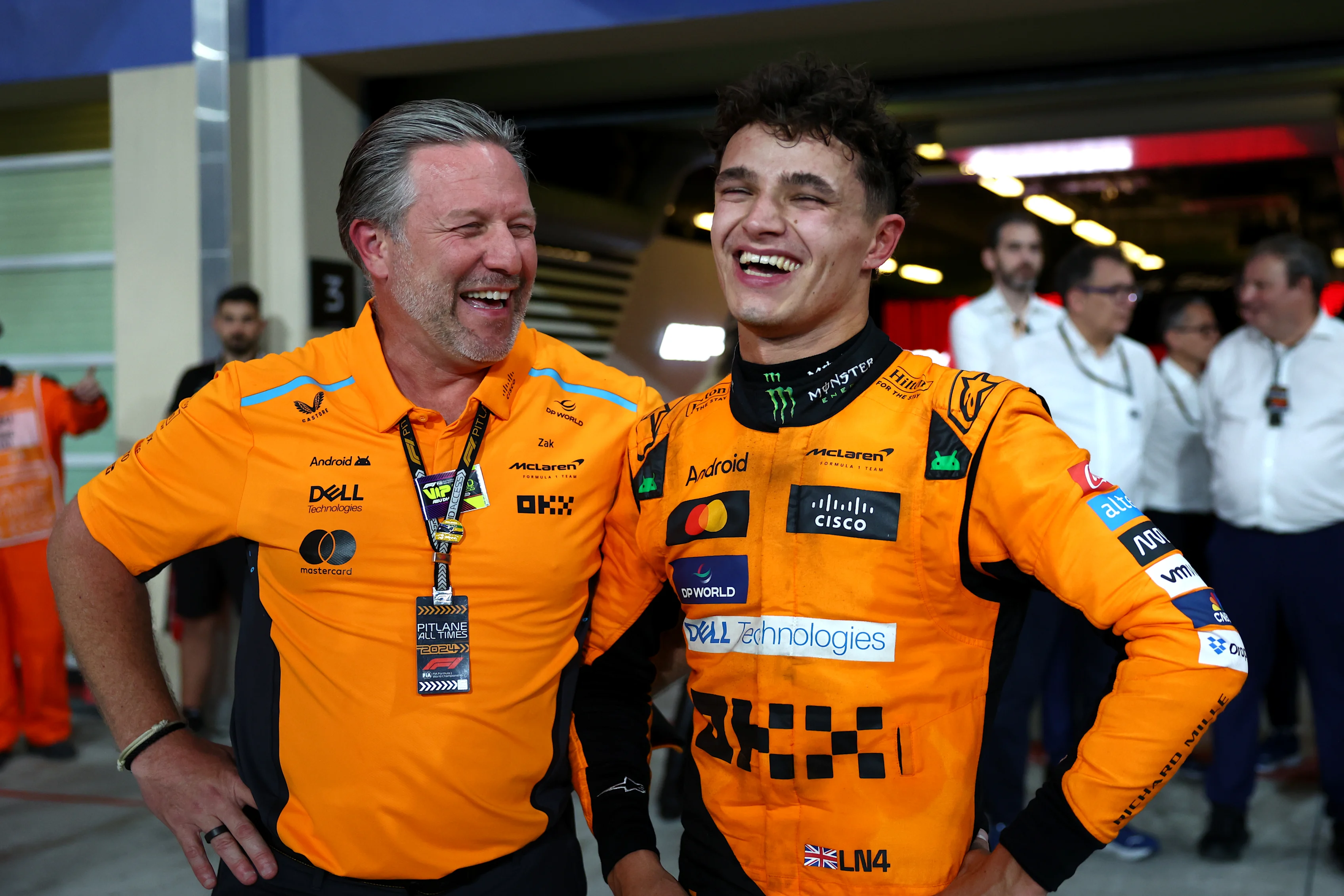 ABU DHABI, UNITED ARAB EMIRATES - DECEMBER 08: Race winner Lando Norris of Great Britain and McLaren and McLaren Chief Executive Officer Zak Brown celebrate in parc ferme after the McLaren team won the 2024 F1 Constructors Championship during the F1 Grand Prix of Abu Dhabi at Yas Marina Circuit on December 08, 2024 in Abu Dhabi, United Arab Emirates. (Photo by Bryn Lennon - Formula 1/Formula 1 via Getty Images)