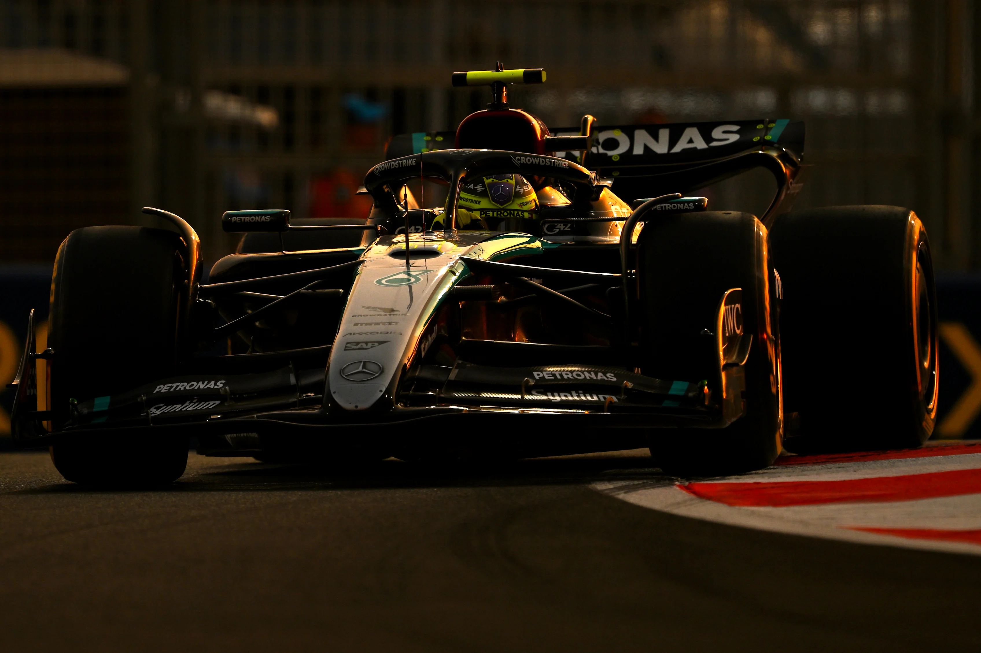 ABU DHABI, UNITED ARAB EMIRATES - DECEMBER 06: Lewis Hamilton of Great Britain driving the (44) Mercedes AMG Petronas F1 Team W15 otm during practice ahead of the F1 Grand Prix of Abu Dhabi at Yas Marina Circuit on December 06, 2024 in Abu Dhabi, United Arab Emirates. (Photo by Clive Mason/Getty Images)