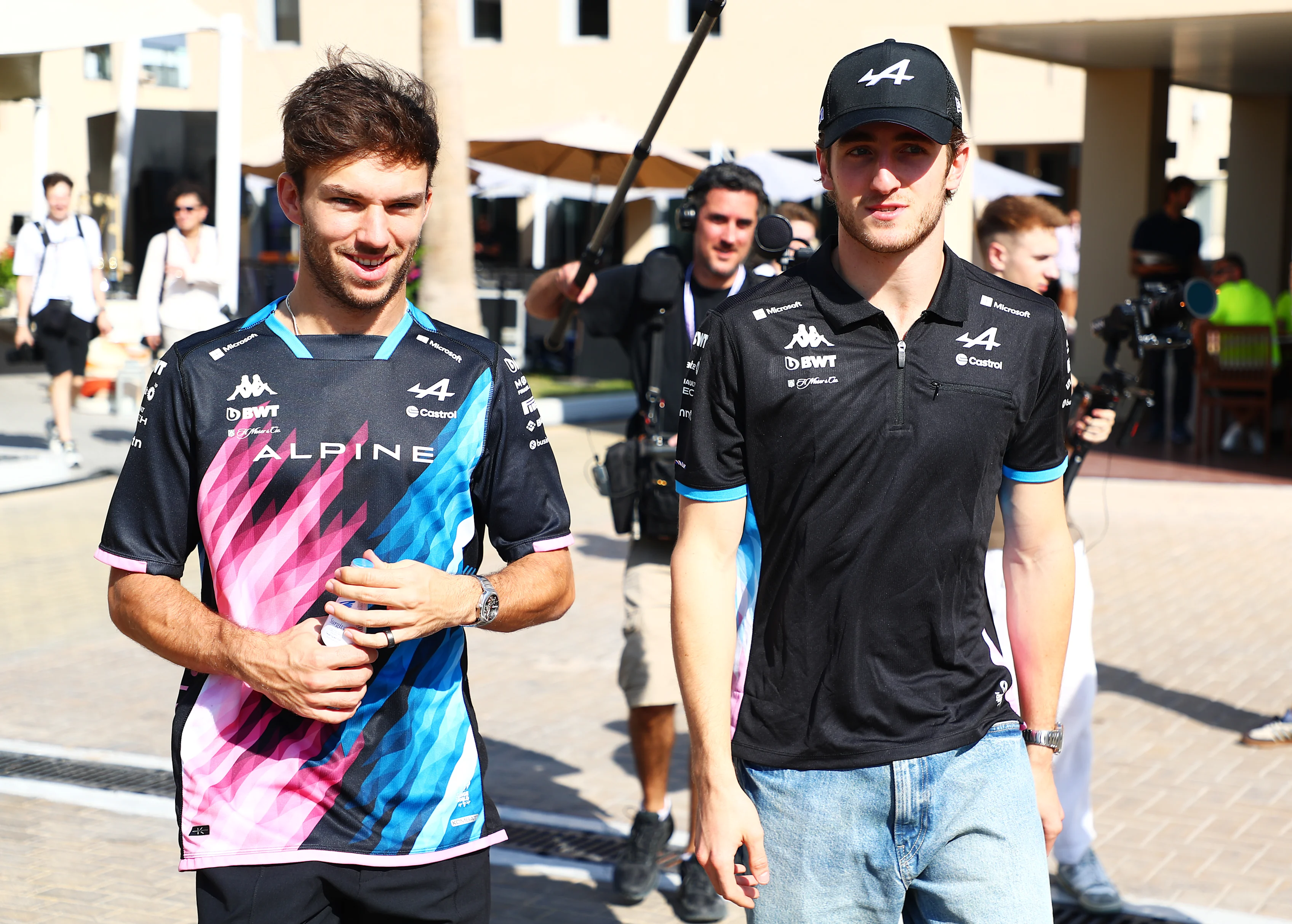 Pierre Gasly and Jack Doohan walk in the Paddock during previews ahead of the F1 Grand Prix of Abu Dhabi at Yas Marina Circuit on December 05, 2024 in Abu Dhabi, United Arab Emirates. (Photo by Peter Fox - Formula 1/Formula 1 via Getty Images)