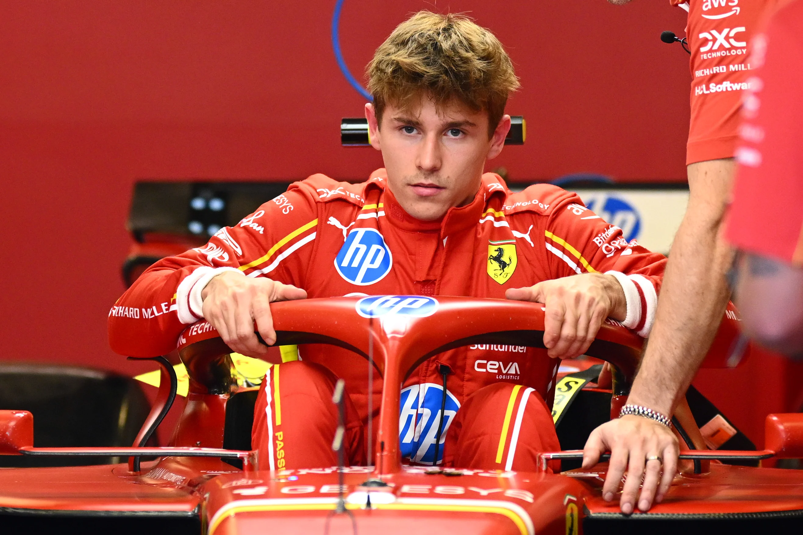 Arthur Leclerc of Monaco and Ferrari has a seat fitting in the garage during previews ahead of the F1 Grand Prix of Abu Dhabi at Yas Marina Circuit on December 05, 2024 in Abu Dhabi, United Arab Emirates. (Photo by Clive Mason/Getty Images)