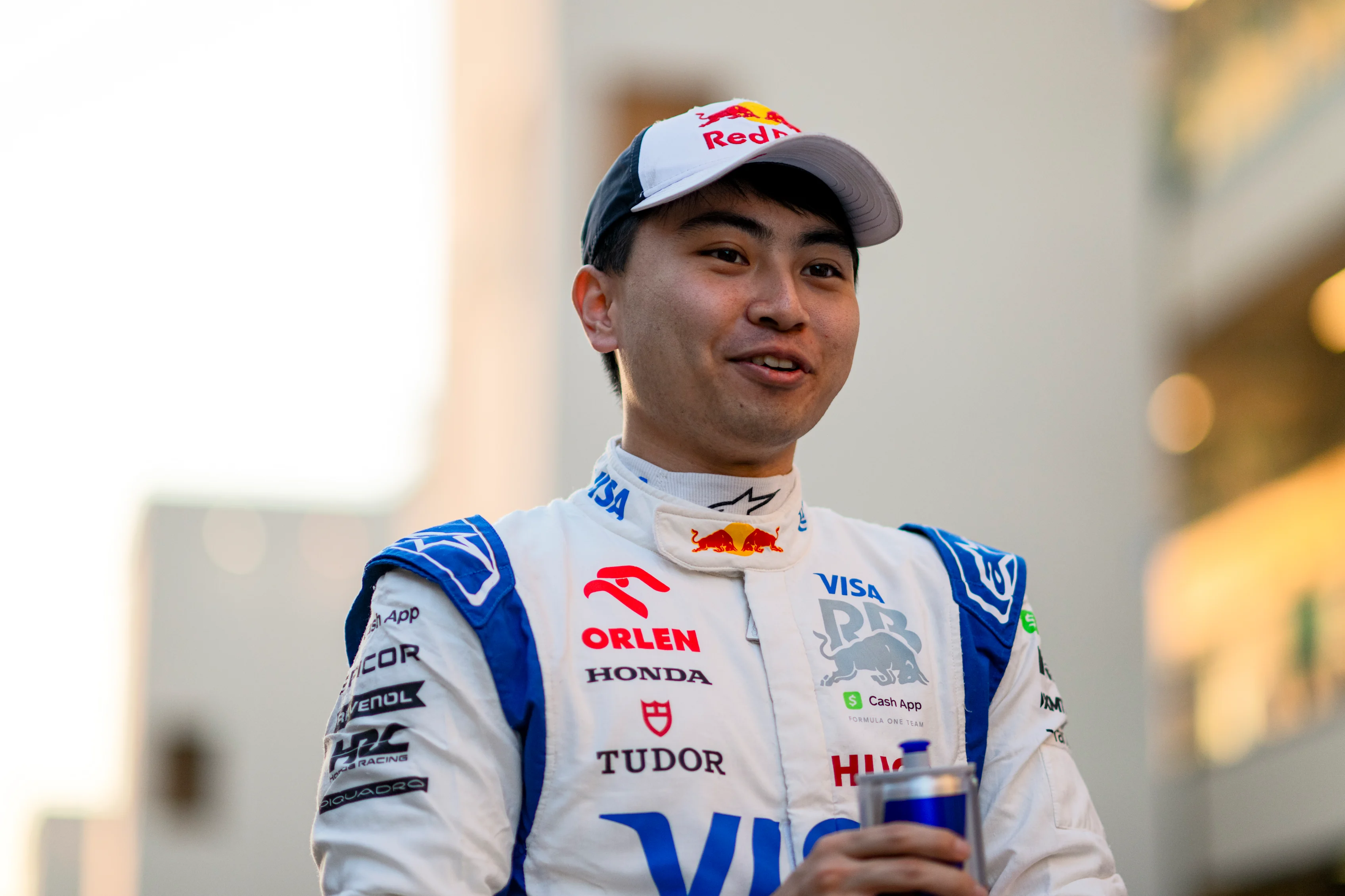 Ayumu Iwasa of Japan and Visa Cash App RB walks in the Paddock during previews ahead of the F1 Grand Prix of Abu Dhabi at Yas Marina Circuit on December 05, 2024 in Abu Dhabi, United Arab Emirates. (Photo by Rudy Carezzevoli/Getty Images)