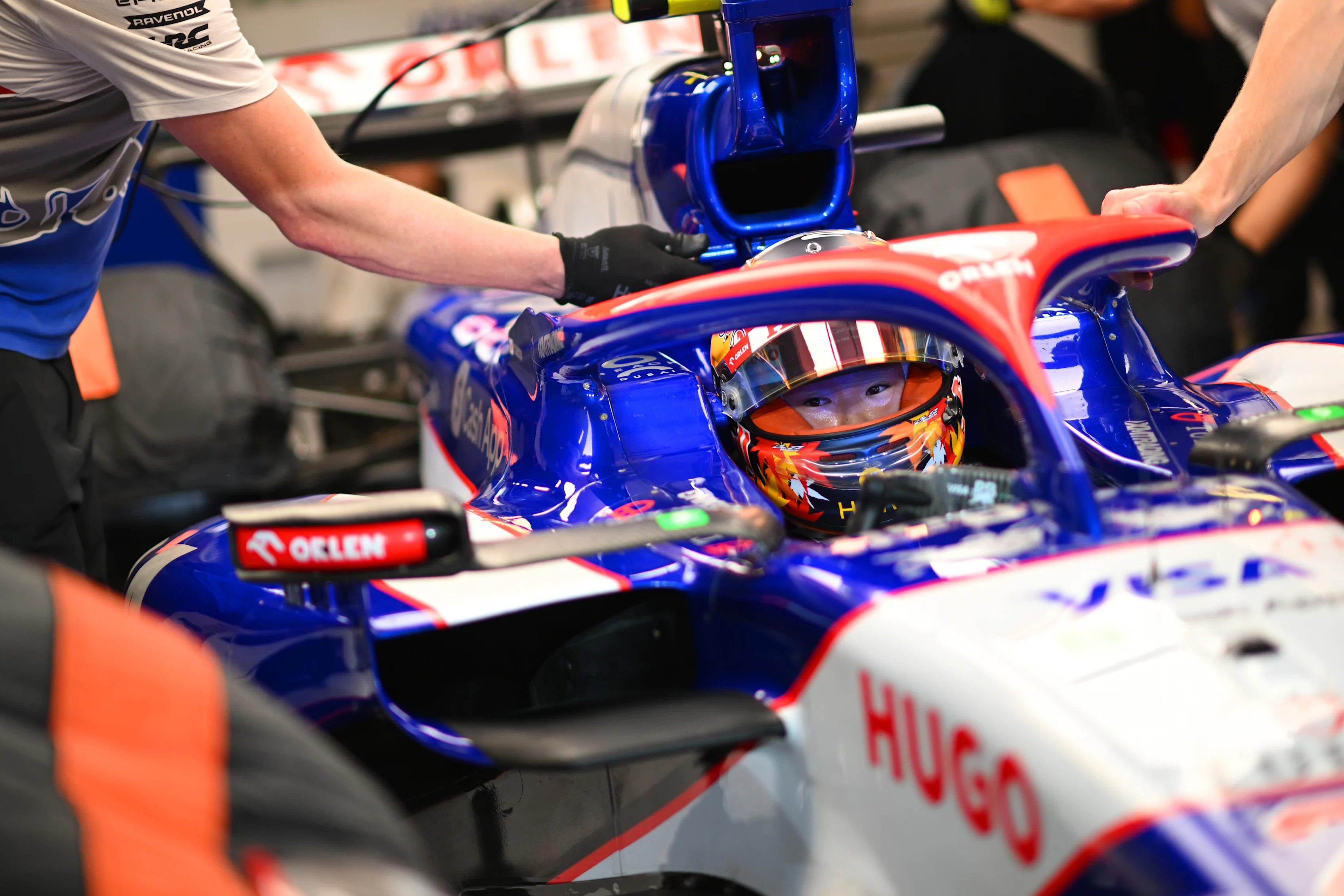 ABU DHABI, UNITED ARAB EMIRATES - DECEMBER 07: Yuki Tsunoda of Japan and Visa Cash App RB prepares to drive in the garage during qualifying ahead of the F1 Grand Prix of Abu Dhabi at Yas Marina Circuit on December 07, 2024 in Abu Dhabi, United Arab Emirates. (Photo by Rudy Carezzevoli/Getty Images)