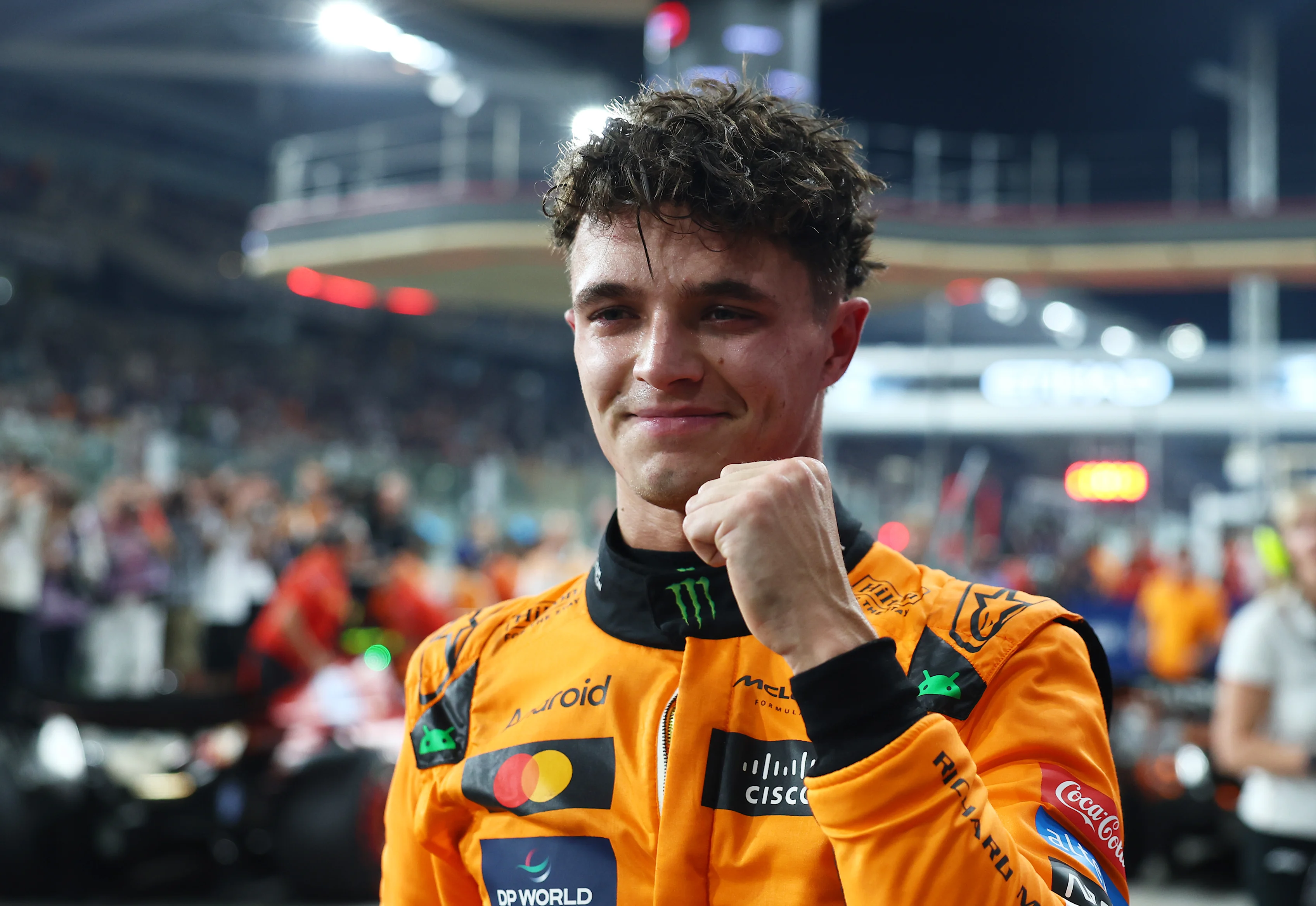 ABU DHABI, UNITED ARAB EMIRATES - DECEMBER 07: Pole position qualifier Lando Norris of Great Britain and McLaren celebrates in parc ferme during qualifying ahead of the F1 Grand Prix of Abu Dhabi at Yas Marina Circuit on December 07, 2024 in Abu Dhabi, United Arab Emirates. (Photo by Bryn Lennon - Formula 1/Formula 1 via Getty Images)