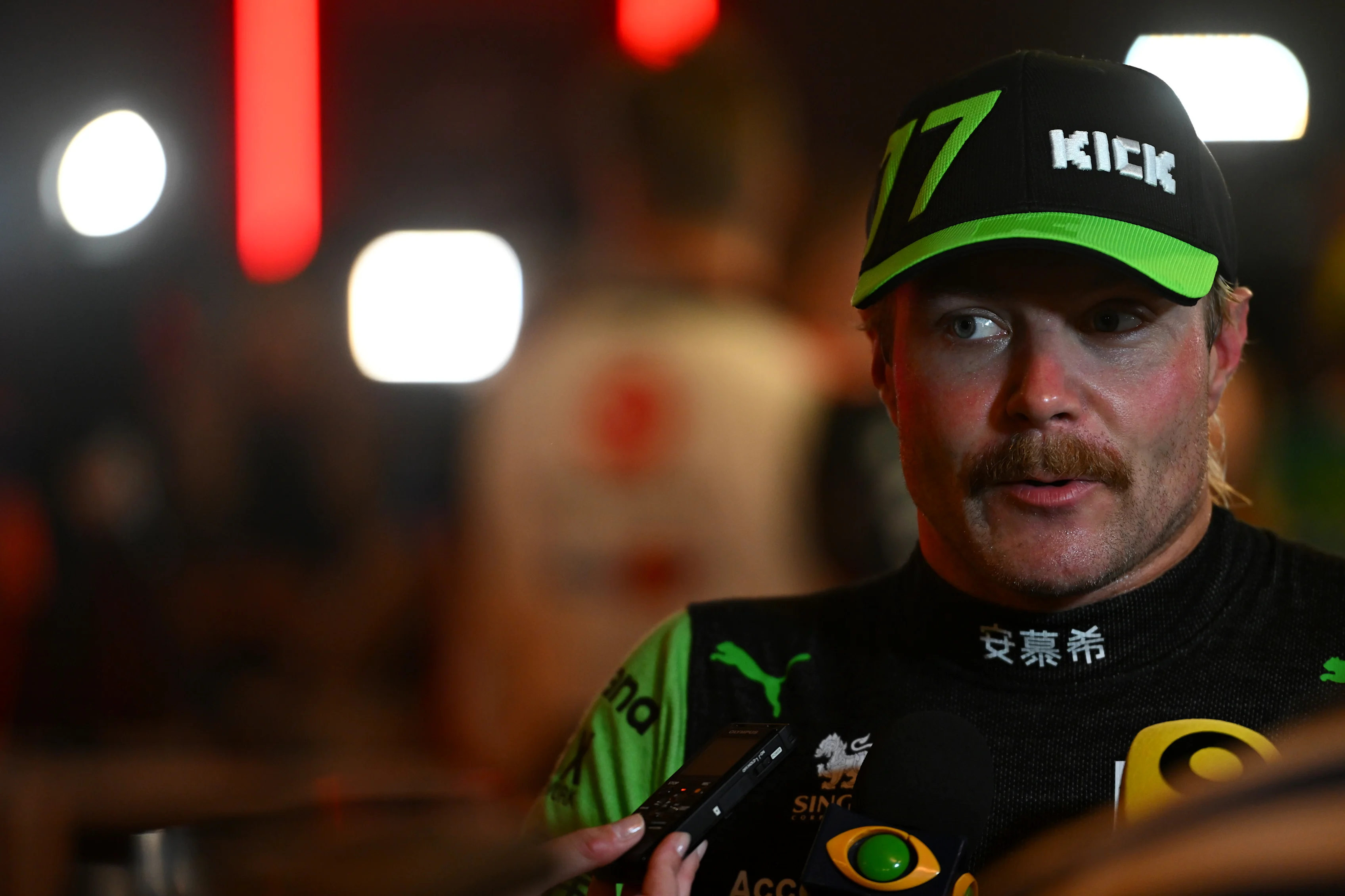 Valtteri Bottas talks to the media in the Paddock after qualifying ahead of the F1 Grand Prix of Abu Dhabi at Yas Marina Circuit on December 07, 2024 in Abu Dhabi, United Arab Emirates. (Photo by Rudy Carezzevoli/Getty Images)