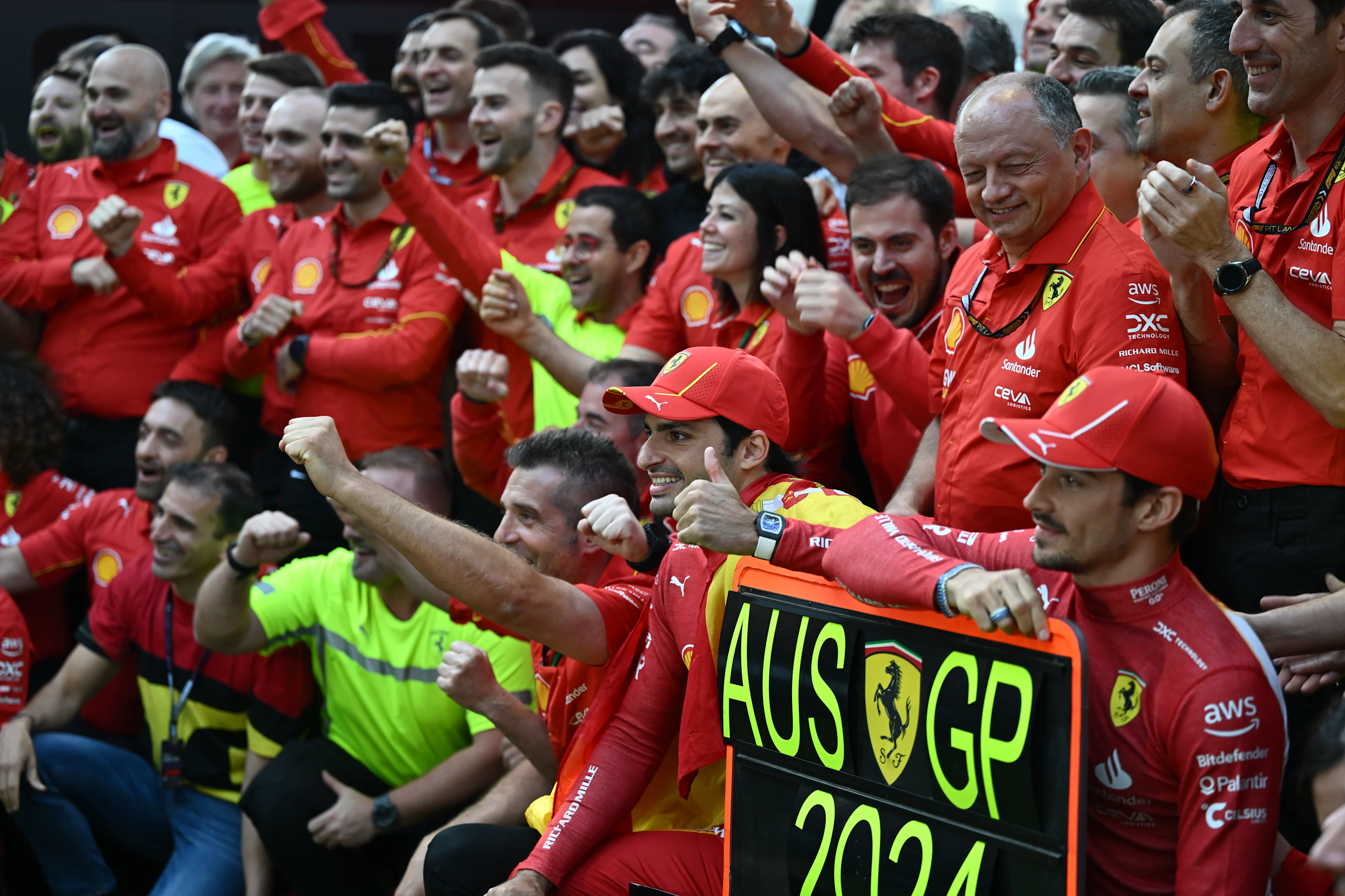 MELBOURNE, AUSTRALIA - MARCH 24: Race winner Carlos Sainz of Spain and Ferrari and Second placed