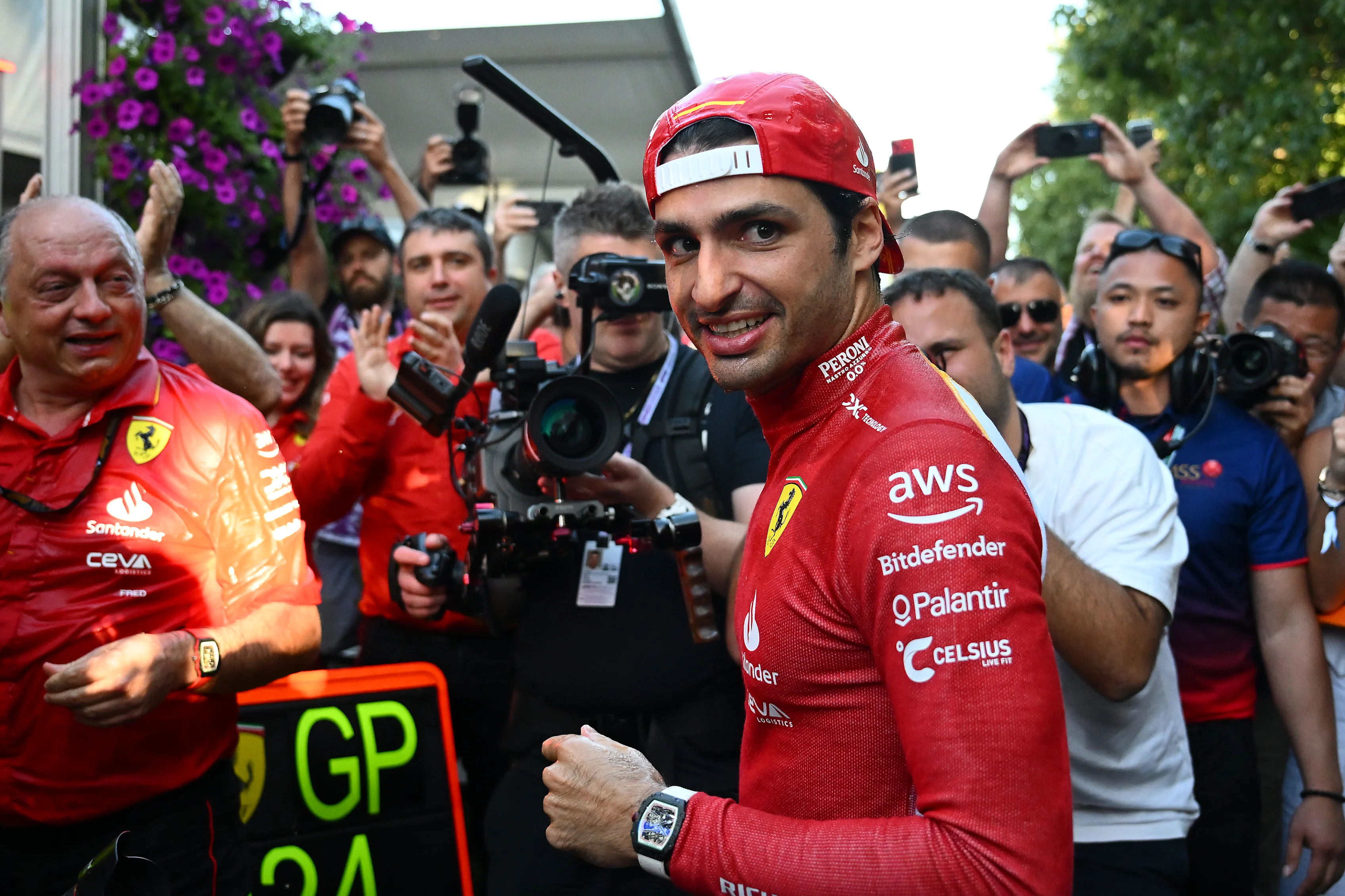 MELBOURNE, AUSTRALIA - MARCH 24: Race winner Carlos Sainz of Spain and Ferrari celebrates with his