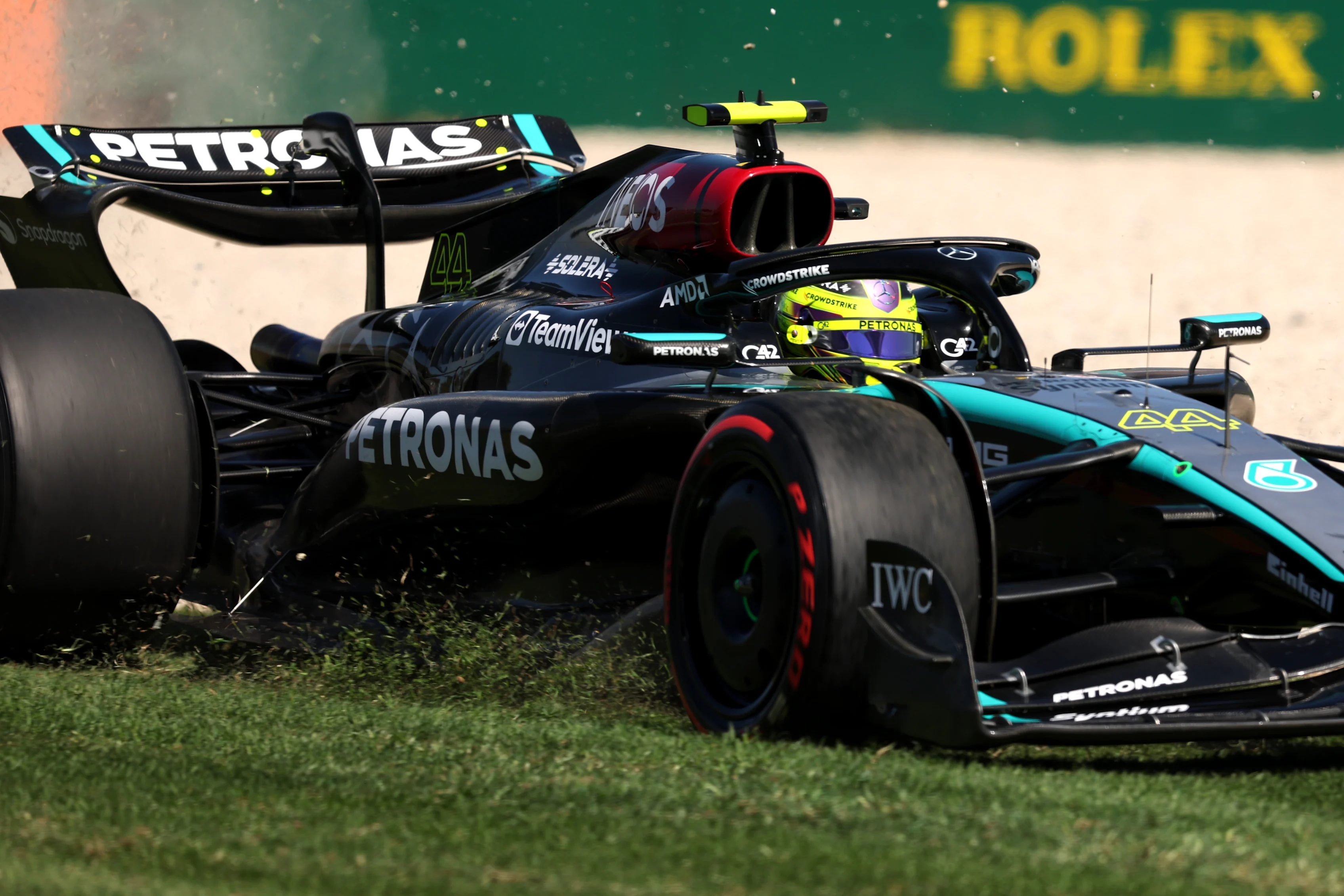 MELBOURNE, AUSTRALIA - MARCH 22: Lewis Hamilton of Great Britain driving the (44) Mercedes AMG Petronas F1 Team W15 runs wide during practice ahead of the F1 Grand Prix of Australia at Albert Park Circuit on March 22, 2024 in Melbourne, Australia. (Photo by Robert Cianflone/Getty Images)
