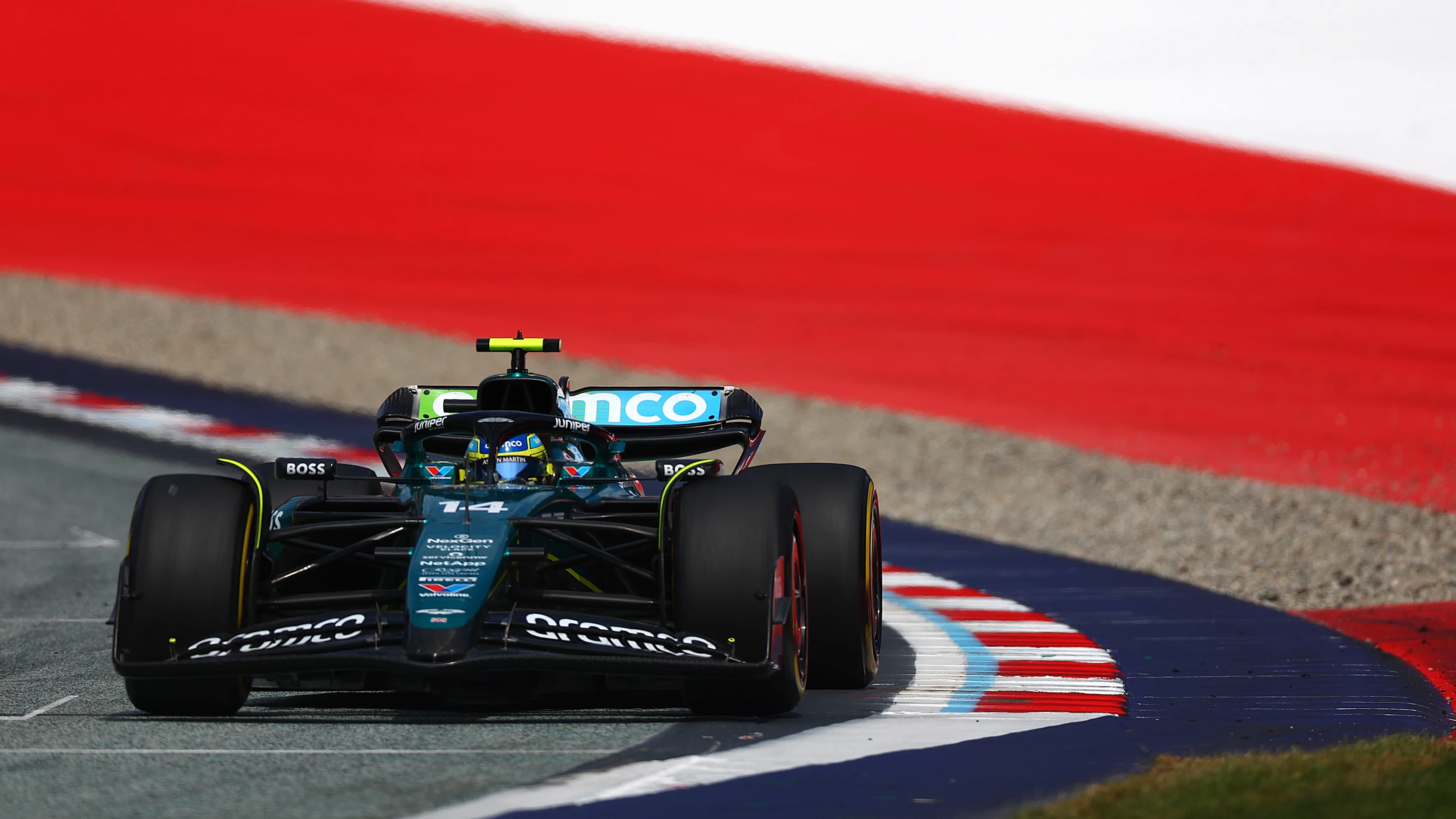 SPIELBERG, AUSTRIA - JUNE 30: Fernando Alonso of Spain driving the (14) Aston Martin AMR24 Mercedes