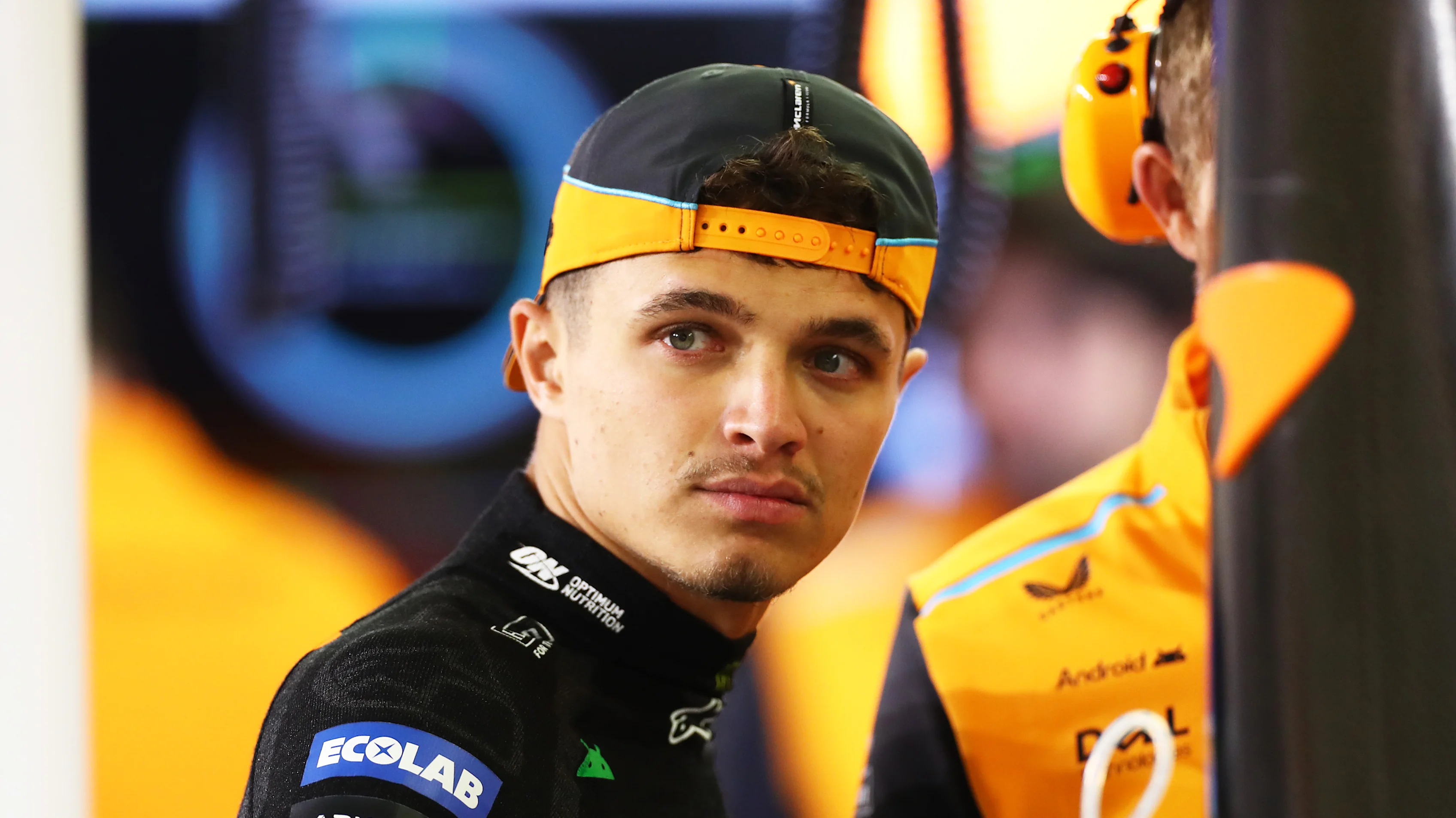 BAHRAIN, BAHRAIN - FEBRUARY 29: Lando Norris of Great Britain and McLaren prepares to drive in the garage during practice ahead of the F1 Grand Prix of Bahrain at Bahrain International Circuit on February 29, 2024 in Bahrain, Bahrain. (Photo by Peter Fox - Formula 1/Formula 1 via Getty Images)