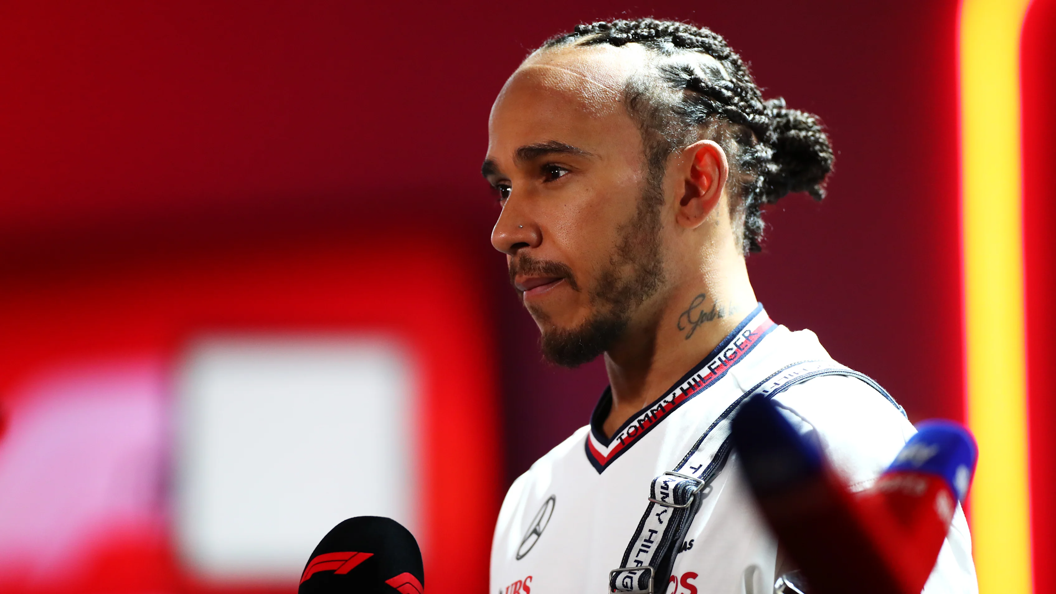 BAHRAIN, BAHRAIN - FEBRUARY 29: Lewis Hamilton of Great Britain and Mercedes talks to the media in