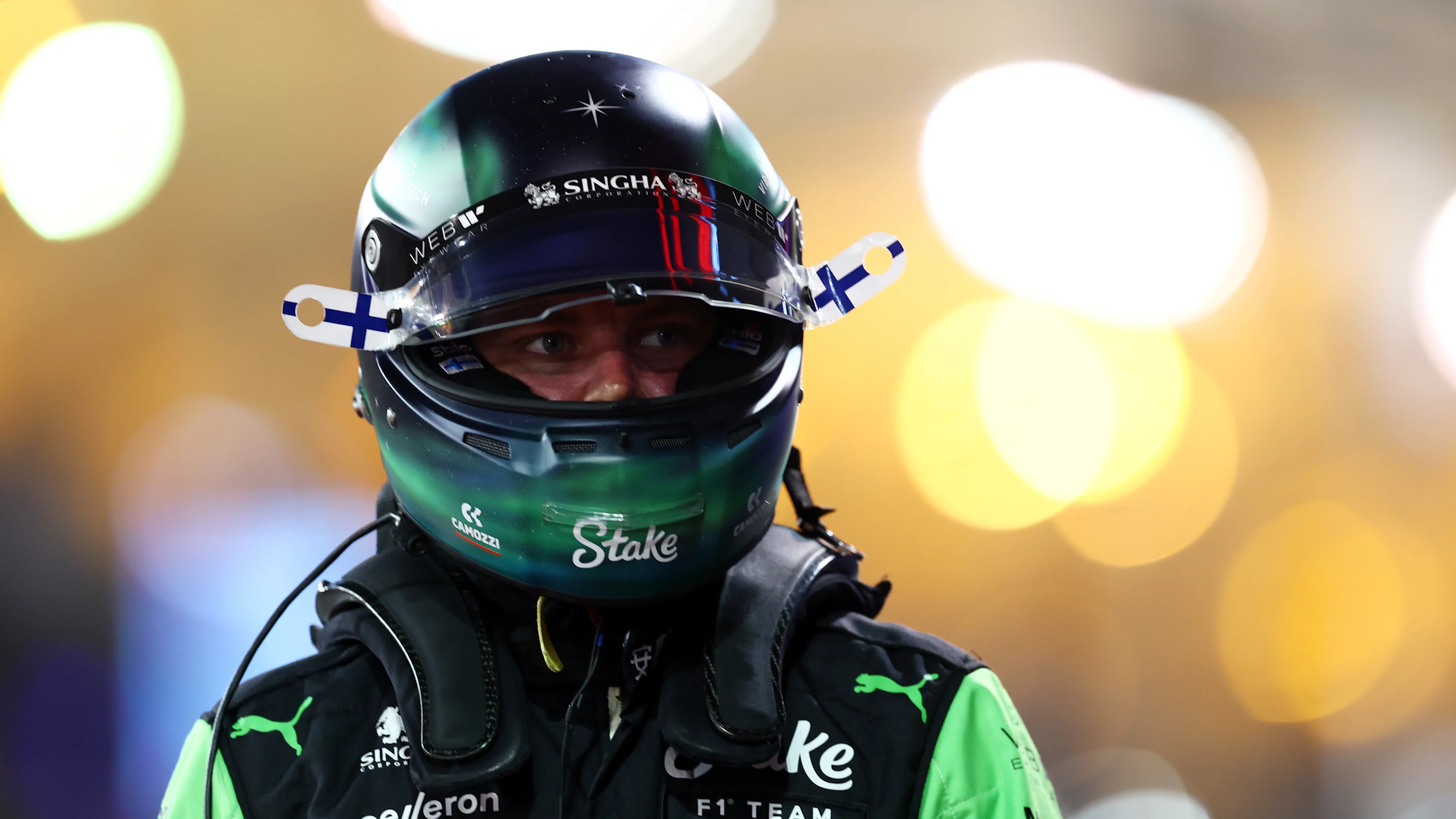 BAHRAIN, BAHRAIN - MARCH 01: 16th placed qualifier Valtteri Bottas of Finland and Stake F1 Team Kick Sauber walks in the Pitlane during qualifying ahead of the F1 Grand Prix of Bahrain at Bahrain International Circuit on March 01, 2024 in Bahrain, Bahrain. (Photo by Bryn Lennon - Formula 1/Formula 1 via Getty Images)