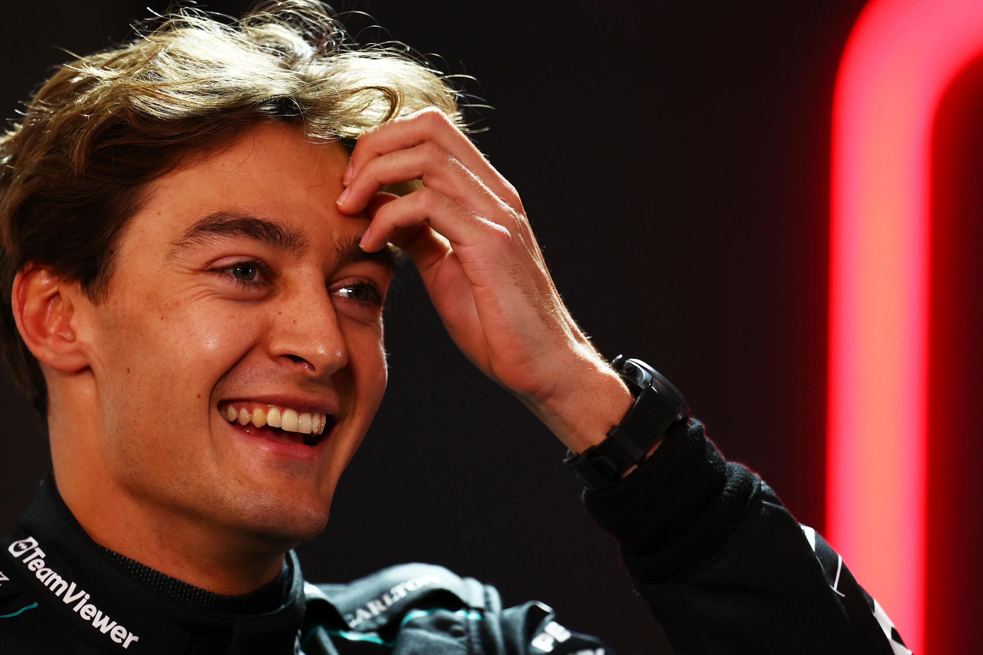 BAHRAIN, BAHRAIN - MARCH 01: Third placed qualifier George Russell of Great Britain and Mercedes reacts in the paddock during qualifying ahead of the F1 Grand Prix of Bahrain at Bahrain International Circuit on March 01, 2024 in Bahrain, Bahrain. (Photo by Clive Rose/Getty Images)