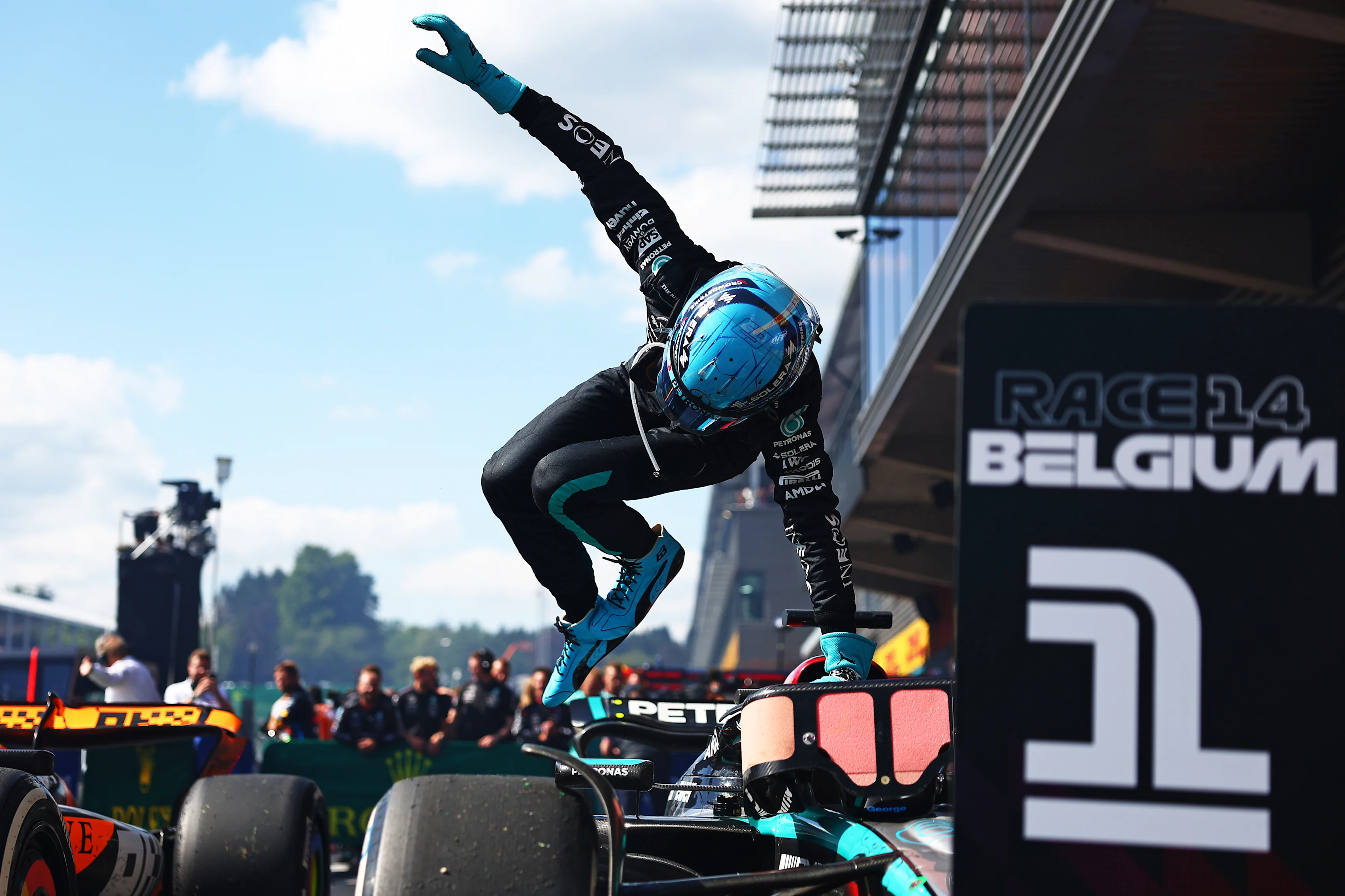 SPA, BELGIUM - JULY 28: Race winner George Russell of Great Britain and Mercedes jumps out of his car as he celebrates in parc ferme during the F1 Grand Prix of Belgium at Circuit de Spa-Francorchamps on July 28, 2024 in Spa, Belgium. (Photo by Bryn Lennon - Formula 1/Formula 1 via Getty Images)