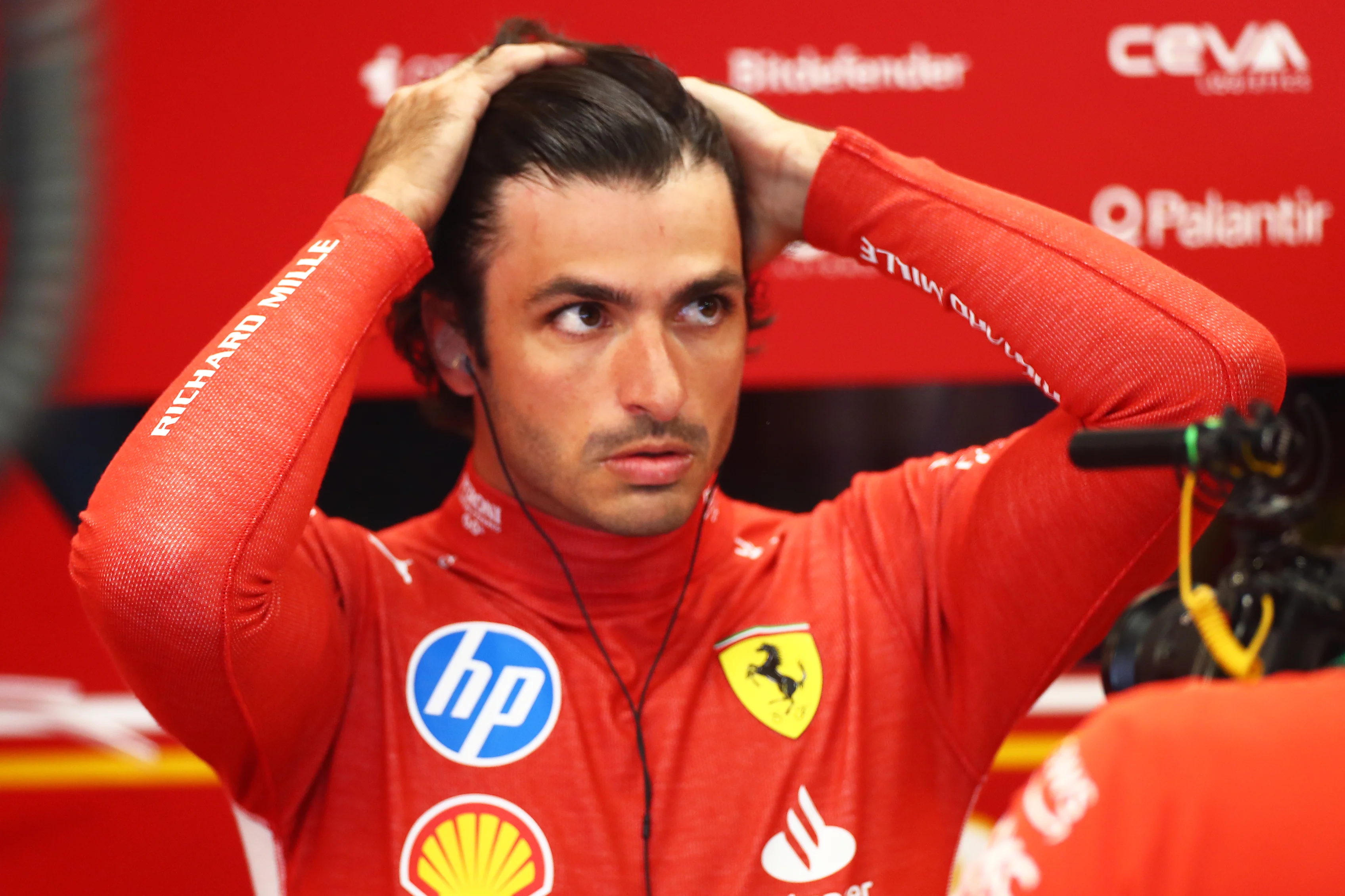 SAO PAULO, BRAZIL - NOVEMBER 01: Carlos Sainz of Spain and Ferrari prepares to drive in the garage during practice ahead of the F1 Grand Prix of Brazil at Autodromo Jose Carlos Pace on November 01, 2024 in Sao Paulo, Brazil. (Photo by Peter Fox - Formula 1/Formula 1 via Getty Images)