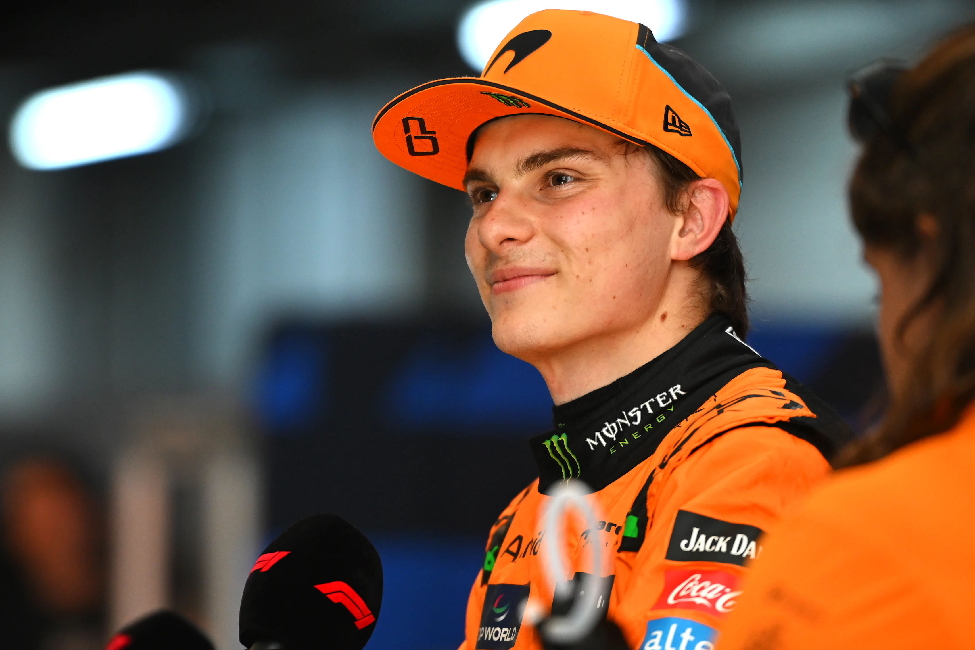 SAO PAULO, BRAZIL - NOVEMBER 01: Sprint Pole qualifier Oscar Piastri talks to the media in the Paddock after Sprint Qualifying at Autodromo Jose Carlos Pace on November 01, 2024 in Sao Paulo, Brazil. (Photo by Rudy Carezzevoli/Getty Images)