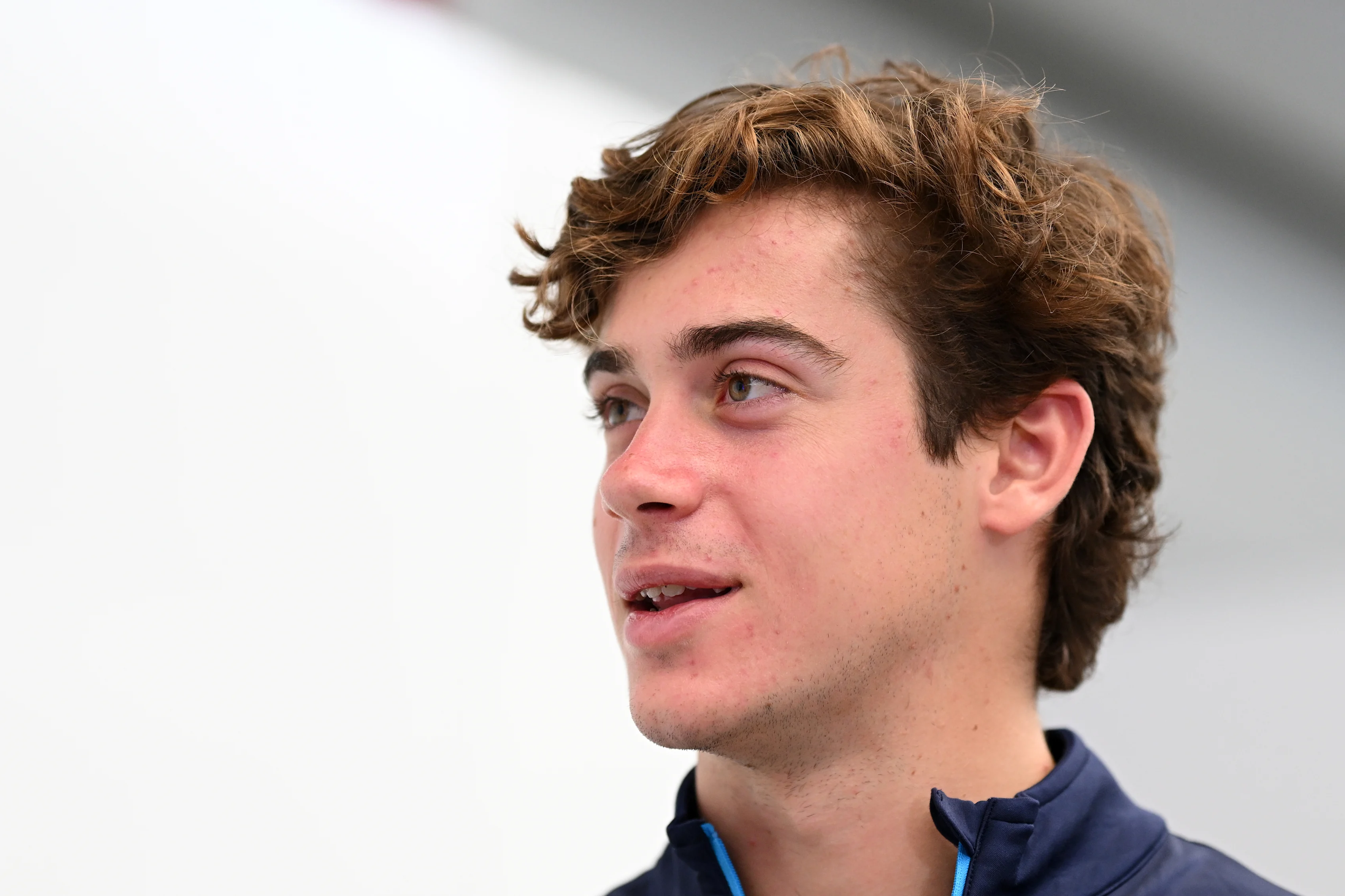 SAO PAULO, BRAZIL - OCTOBER 31: Franco Colapinto of Argentina and Williams looks on in the Paddock ahead of the F1 Grand Prix of Brazil at Autodromo Jose Carlos Pace on October 31, 2024 in Sao Paulo, Brazil. (Photo by Clive Mason/Getty Images)