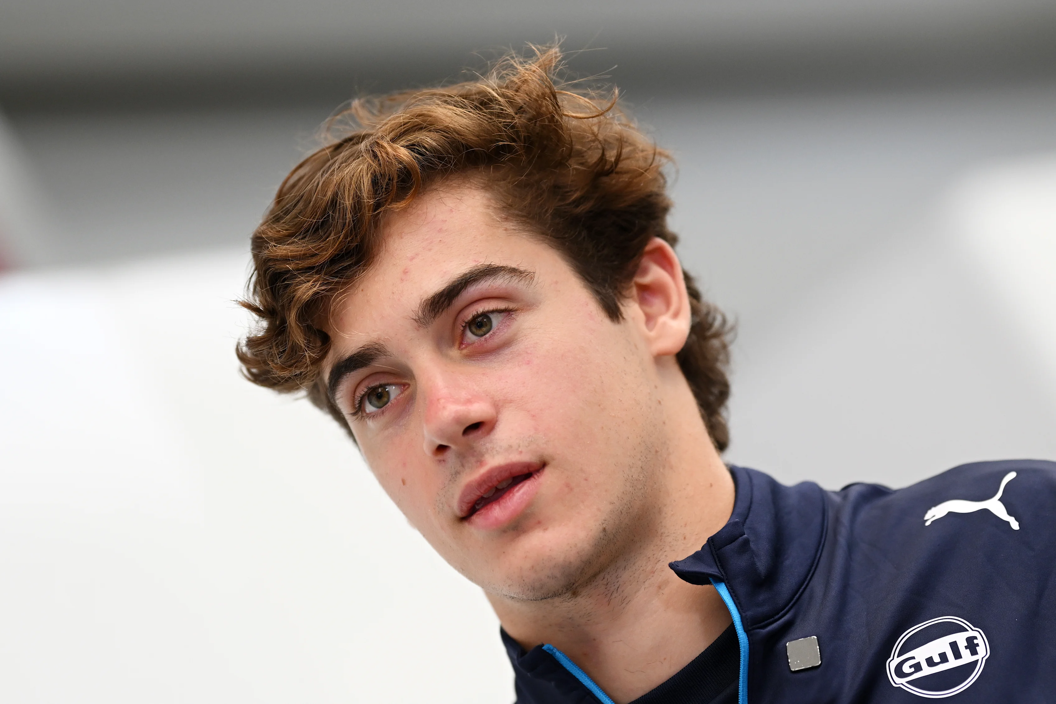 SAO PAULO, BRAZIL - OCTOBER 31: Franco Colapinto of Argentina and Williams looks on in the Paddock