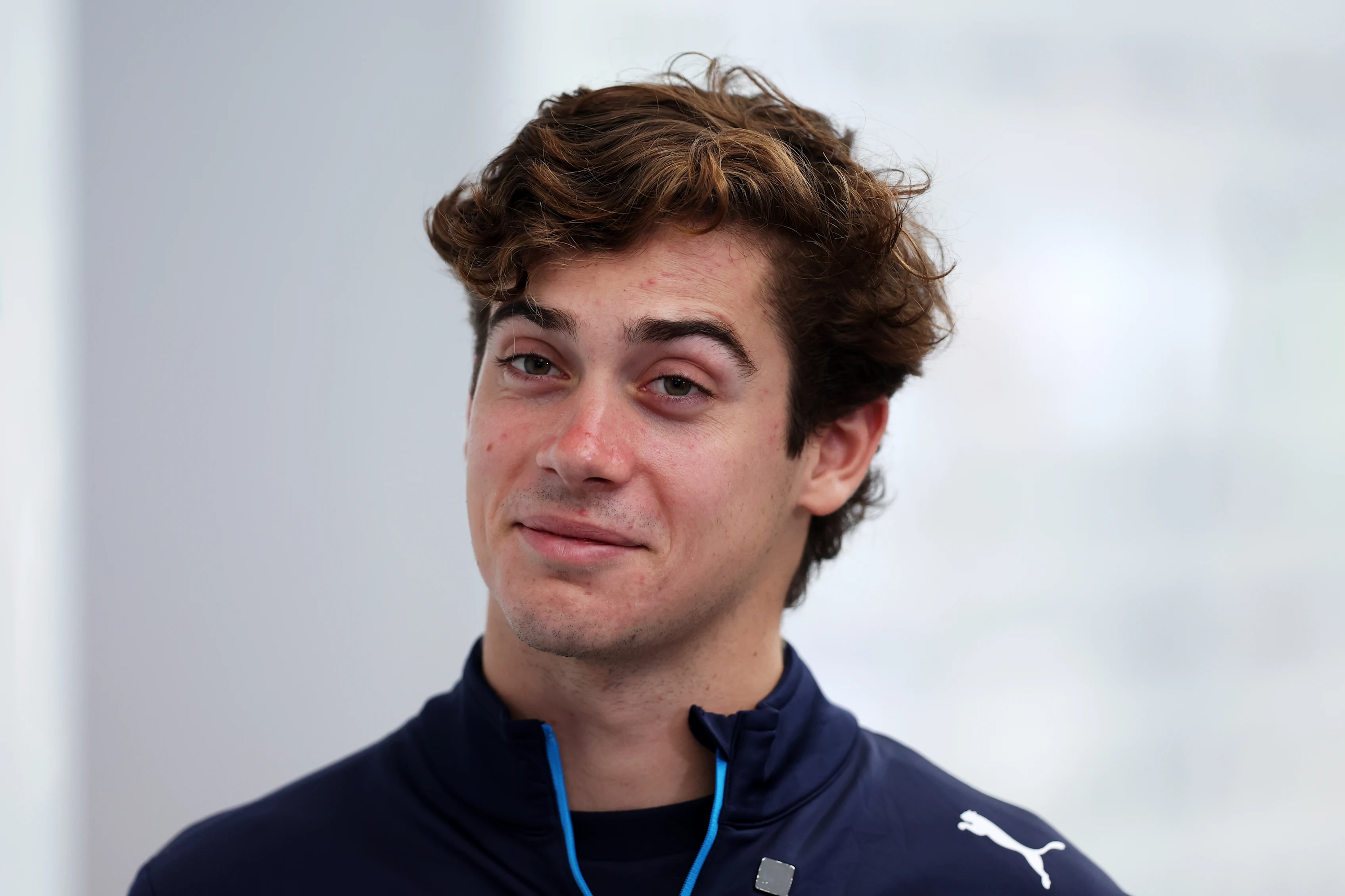 SAO PAULO, BRAZIL - OCTOBER 31: Franco Colapinto looks on in the Paddock during previews ahead of the F1 Grand Prix of Brazil at Autodromo Jose Carlos Pace on October 31, 2024 in Sao Paulo. (Photo by Lars Baron - Formula 1/Formula 1 via Getty Images)