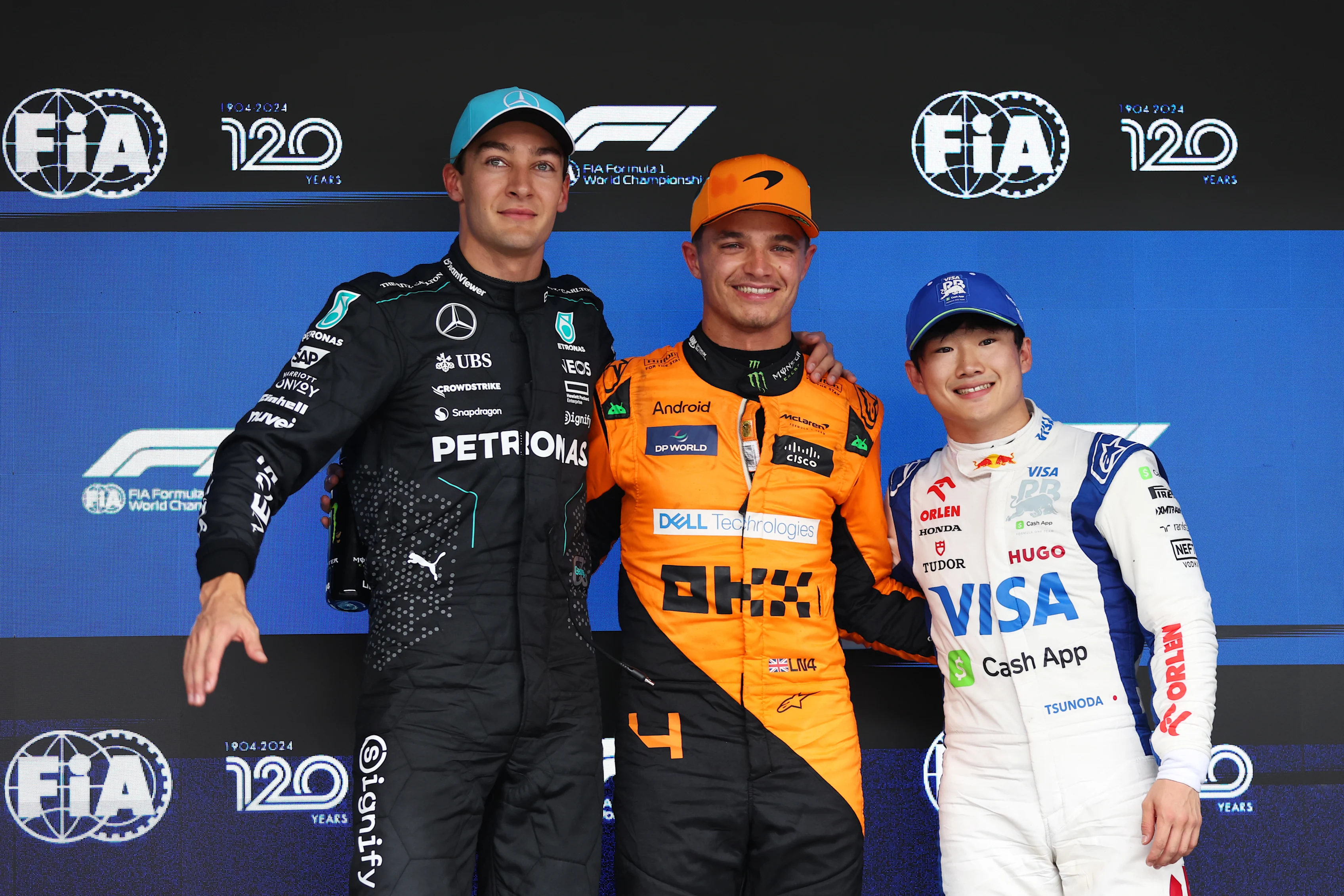 SAO PAULO, BRAZIL - NOVEMBER 03: Lando Norris, George Russell and Yuki Tsunoda after qualifying ahead of the F1 Grand Prix of Brazil at Autodromo Jose Carlos Pace on November 03, 2024 in Sao Paulo, Brazil. (Photo by Lars Baron/Getty Images)