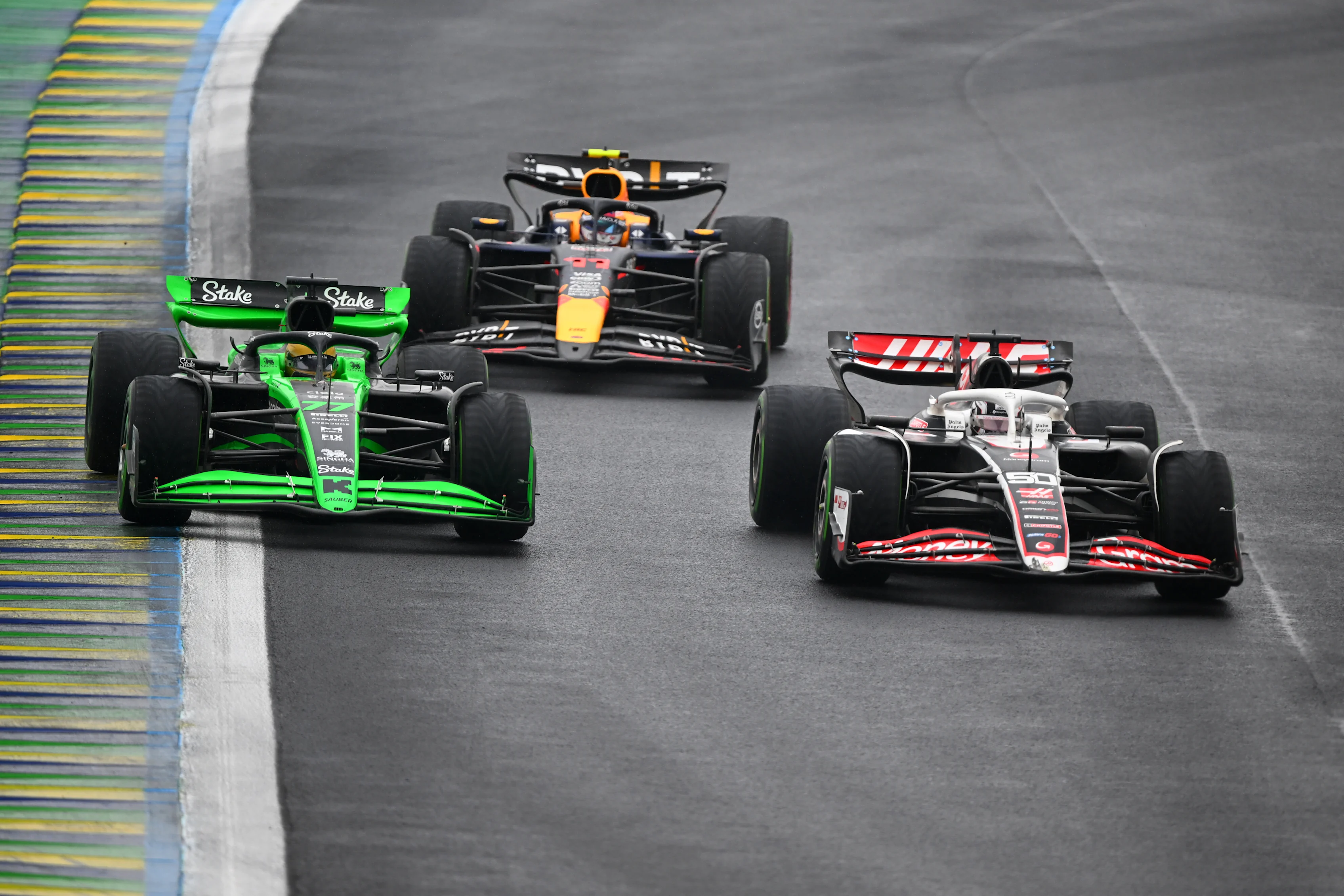 SAO PAULO, BRAZIL - NOVEMBER 03: Oliver Bearman of Great Britain driving the (50) Haas F1 VF-24 Ferrari leads Valtteri Bottas of Finland driving the (77) Kick Sauber C44 Ferrari during the F1 Grand Prix of Brazil at Autodromo Jose Carlos Pace on November 03, 2024 in Sao Paulo, Brazil. (Photo by Clive Mason/Getty Images)