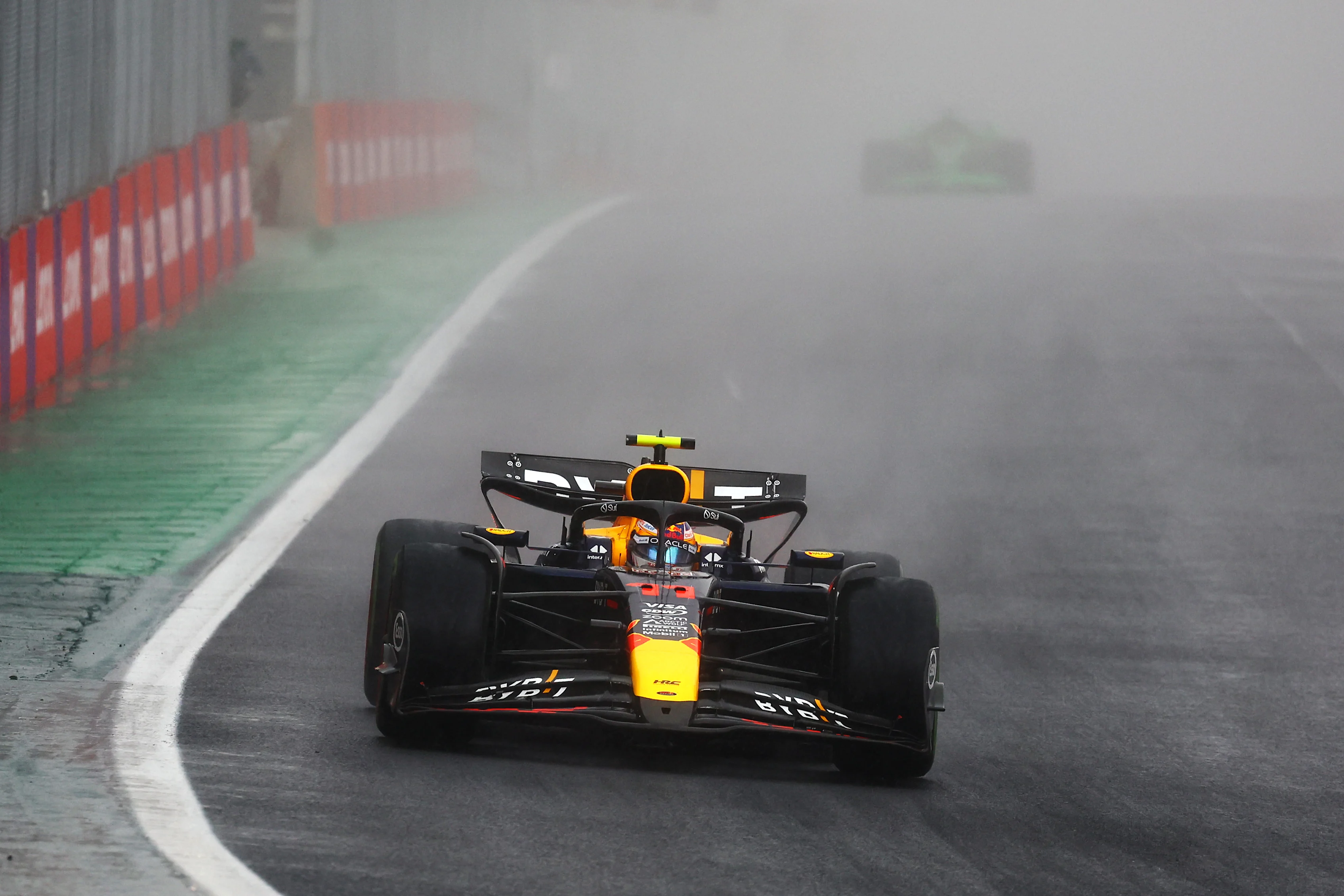 SAO PAULO, BRAZIL - NOVEMBER 03: Sergio Perez of Mexico driving the (11) Oracle Red Bull Racing RB20 on track during the F1 Grand Prix of Brazil at Autodromo Jose Carlos Pace on November 03, 2024 in Sao Paulo, Brazil. (Photo by Mark Thompson/Getty Images)