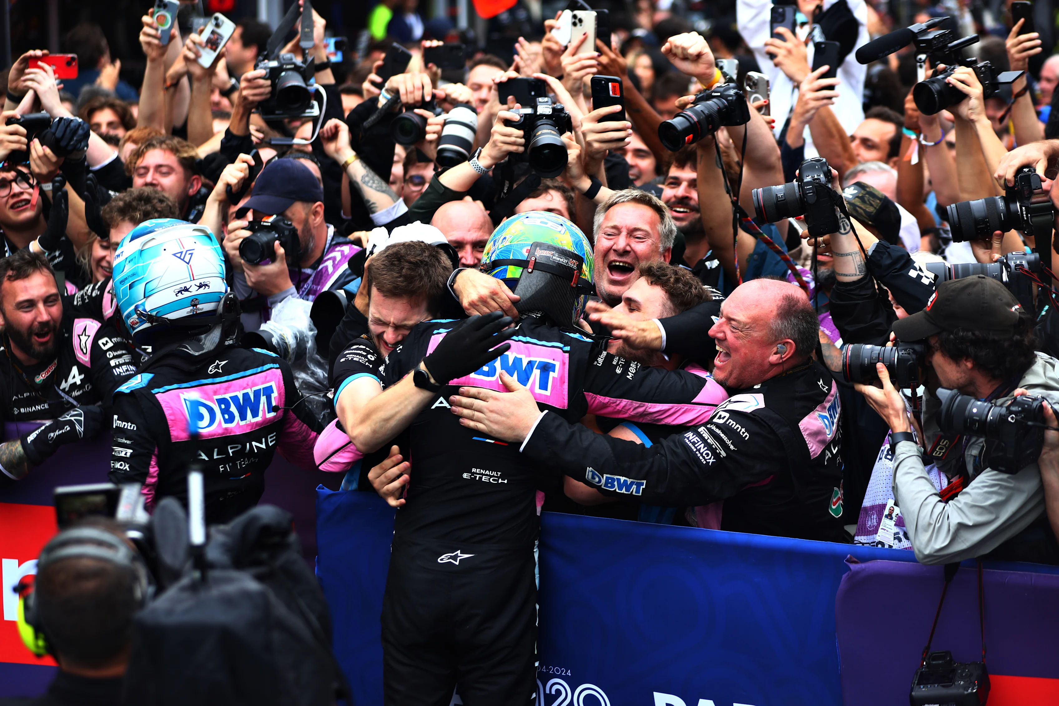 SAO PAULO, BRAZIL: Esteban Ocon and Pierre Gasly celebrate with their team in parc ferme during the F1 Grand Prix of Brazil at Autodromo Jose Carlos Pace on November 03, 2024 in Sao Paulo, Brazil. (Photo by Peter Fox - Formula 1/Formula 1 via Getty Images)