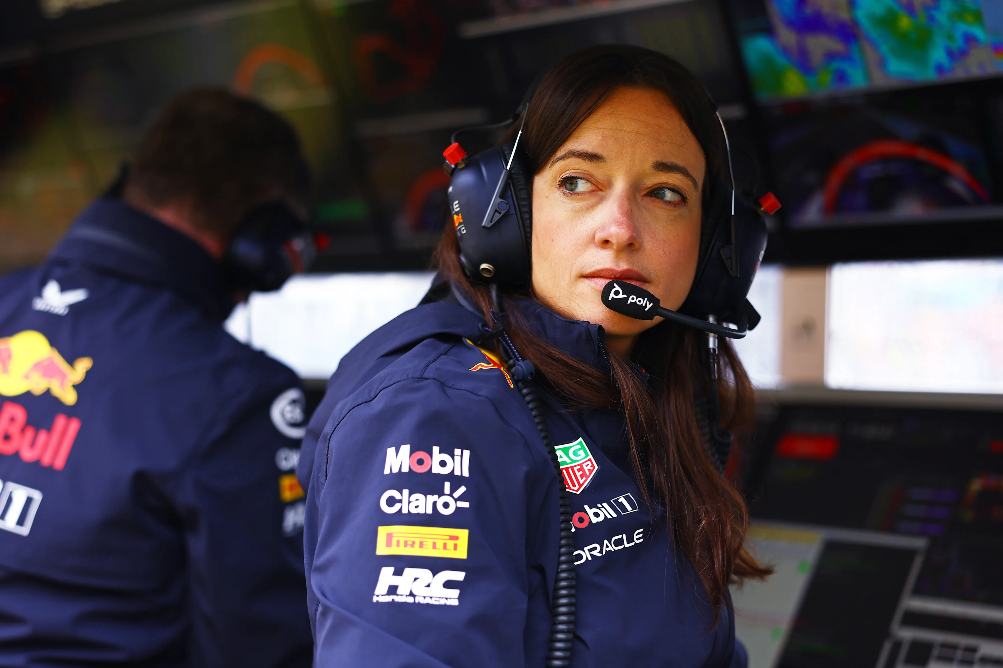 NORTHAMPTON, ENGLAND - JULY 06: Hannah Schmitz, Principal Strategy Engineer of Oracle Red Bull Racing looks on from the pitwall during final practice ahead of the F1 Grand Prix of Great Britain on July 06, 2024. (Photo by Mark Thompson/Getty Images)