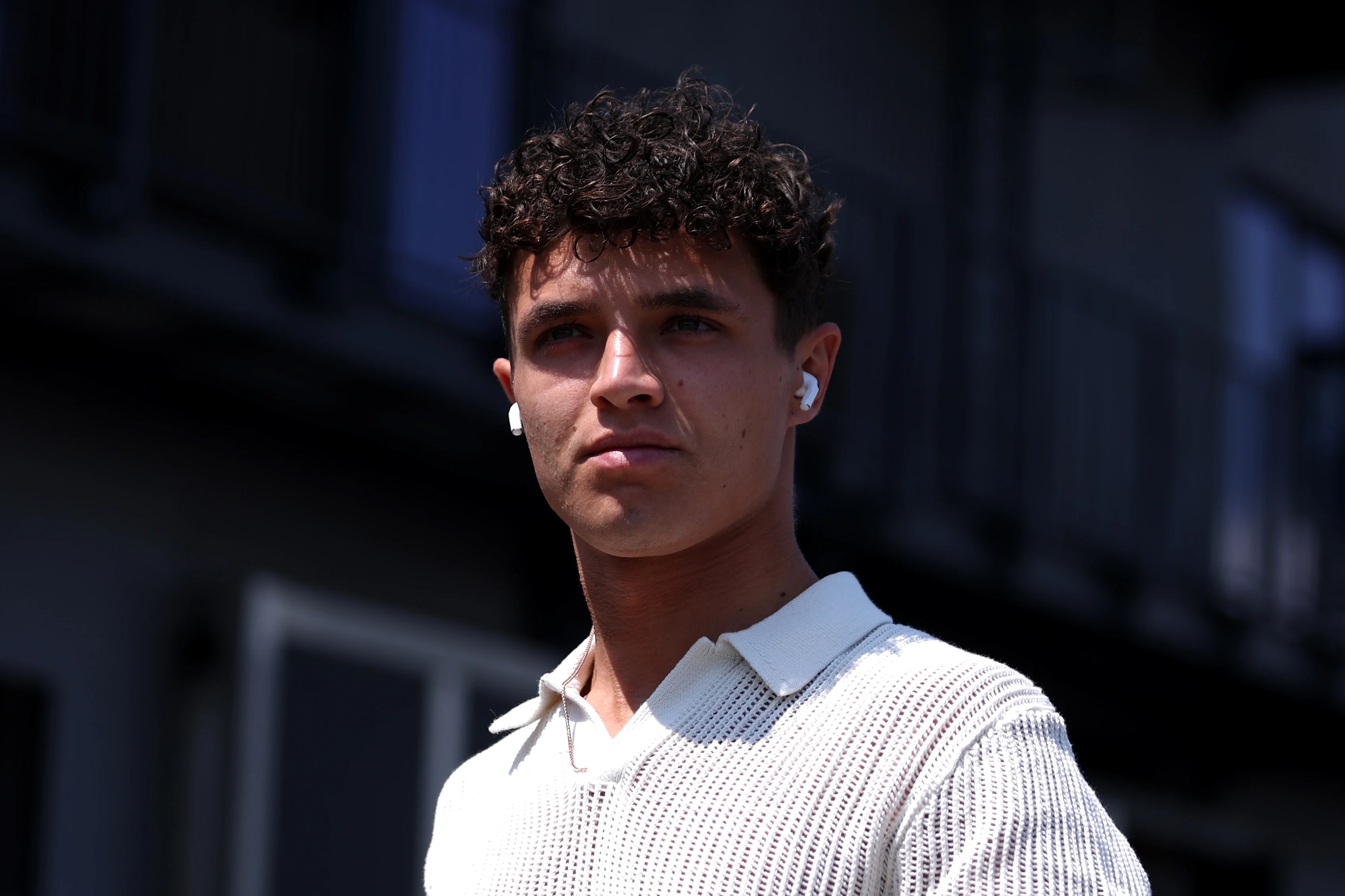 BUDAPEST, HUNGARY - JULY 18: Lando Norris of Great Britain and McLaren walks in the Paddock during