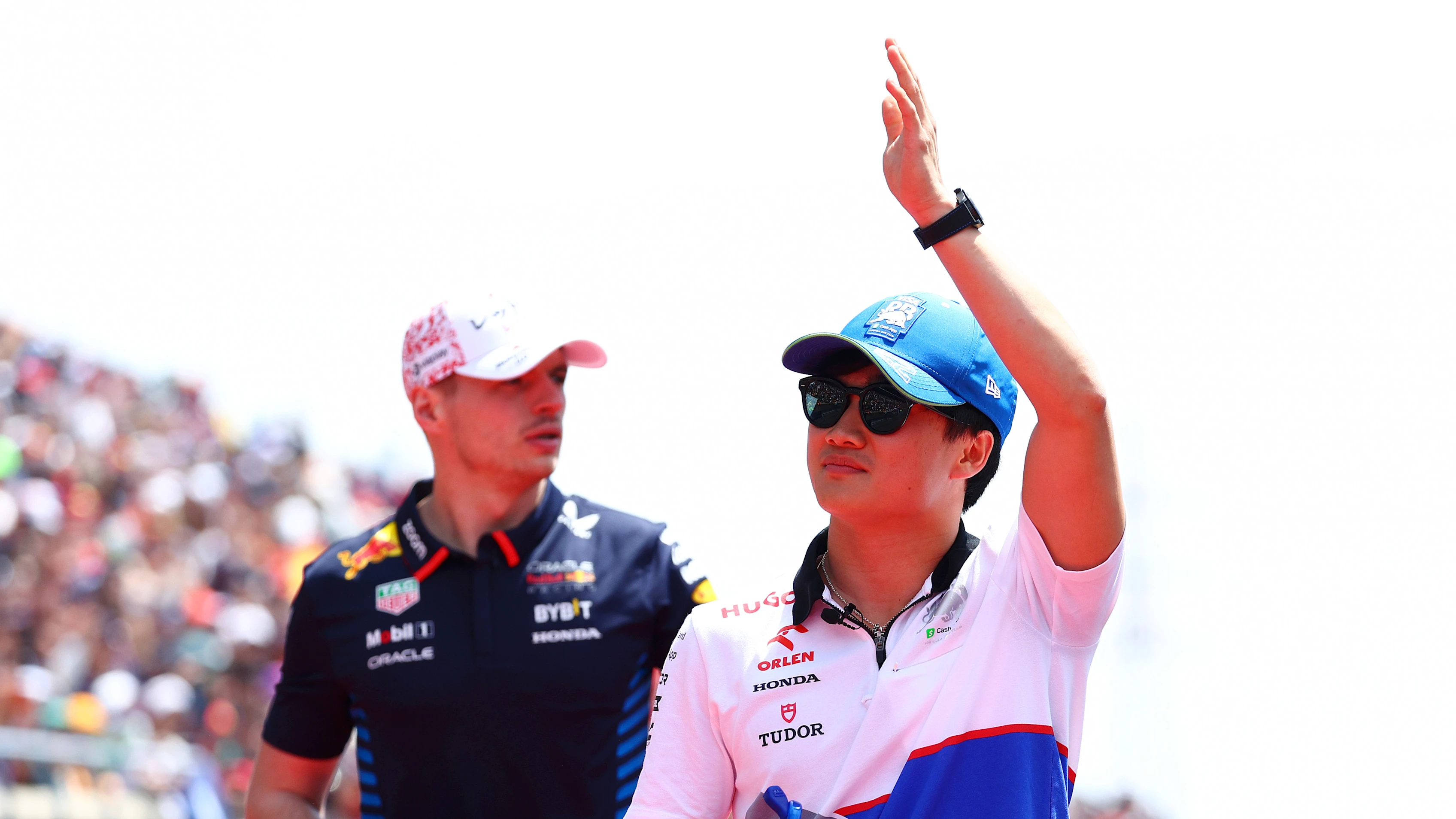 SUZUKA, JAPAN - APRIL 07: Yuki Tsunoda of Japan and Visa Cash App RB waves to the crowd on the