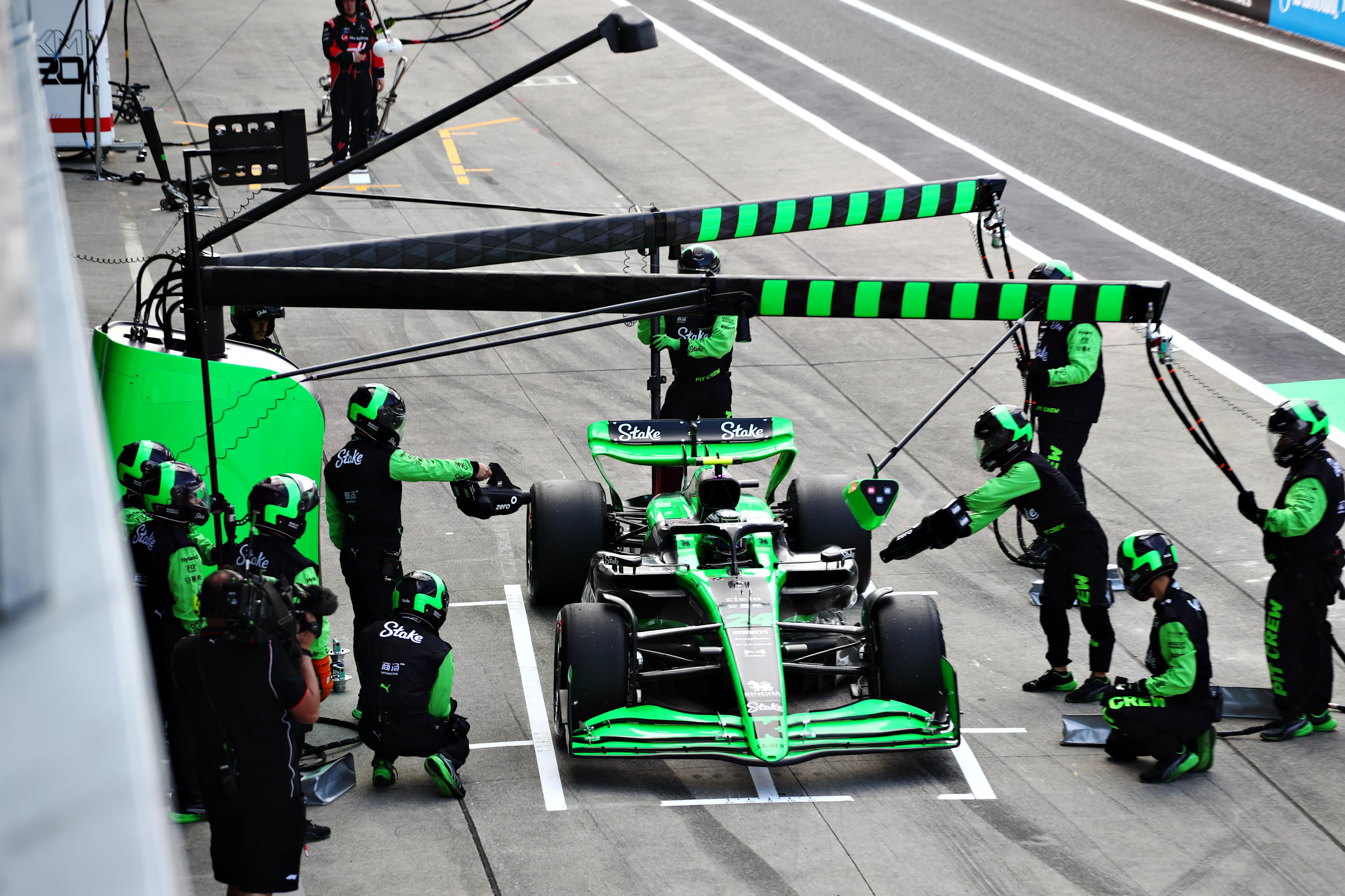SUZUKA, JAPAN - APRIL 07: Zhou Guanyu of China driving the (24) Kick Sauber C44 Ferrari stops in