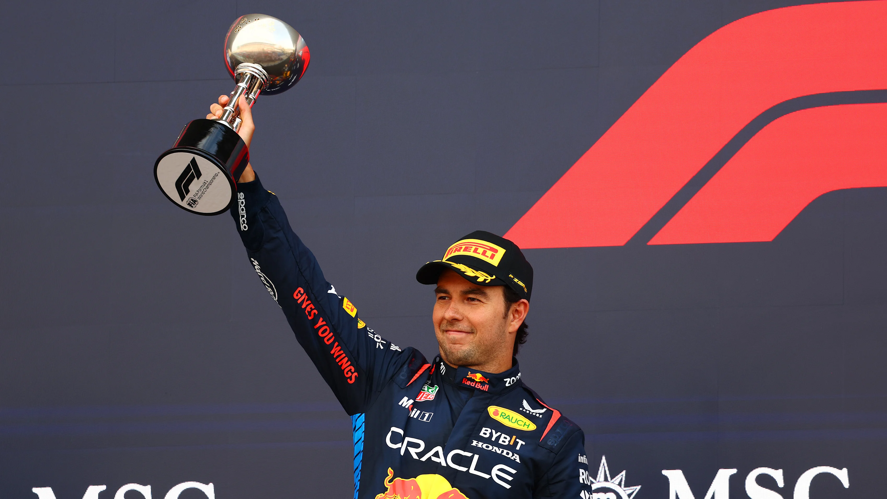 SUZUKA, JAPAN - APRIL 07: Second placed Sergio Perez of Mexico and Oracle Red Bull Racing