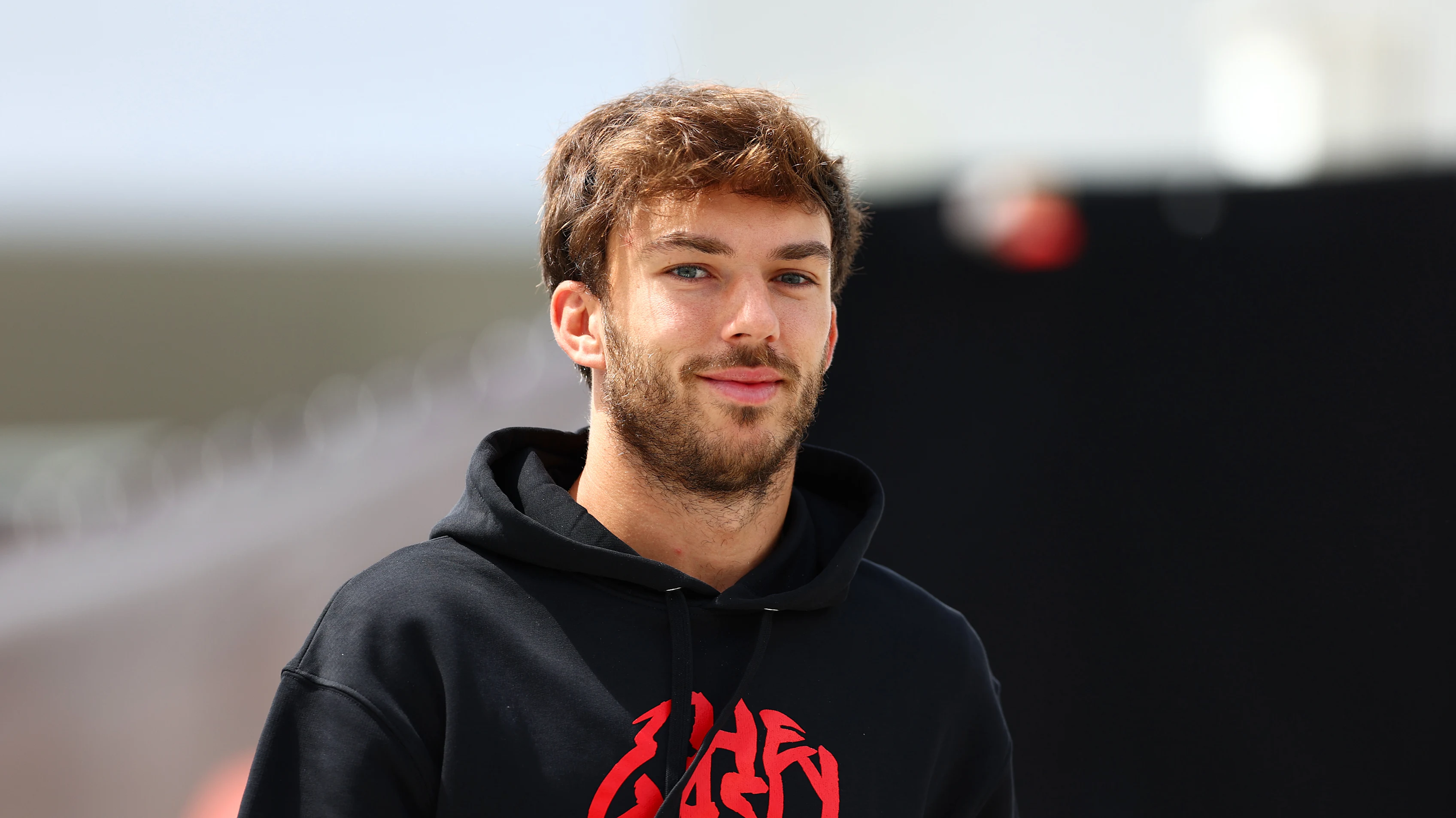 SUZUKA, JAPAN - APRIL 04: Pierre Gasly of France and Alpine F1 walks in the Paddock during previews