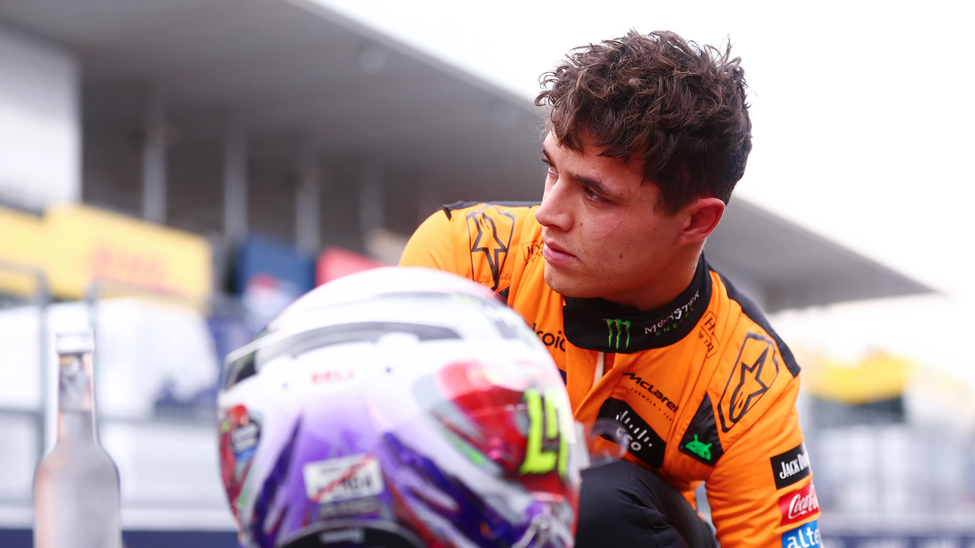SUZUKA, JAPAN - APRIL 06: Third placed qualifier Lando Norris of Great Britain and McLaren looks on in parc ferme during qualifying ahead of the F1 Grand Prix of Japan at Suzuka International Racing Course on April 06, 2024 in Suzuka, Japan. (Photo by Bryn Lennon - Formula 1/Formula 1 via Getty Images)