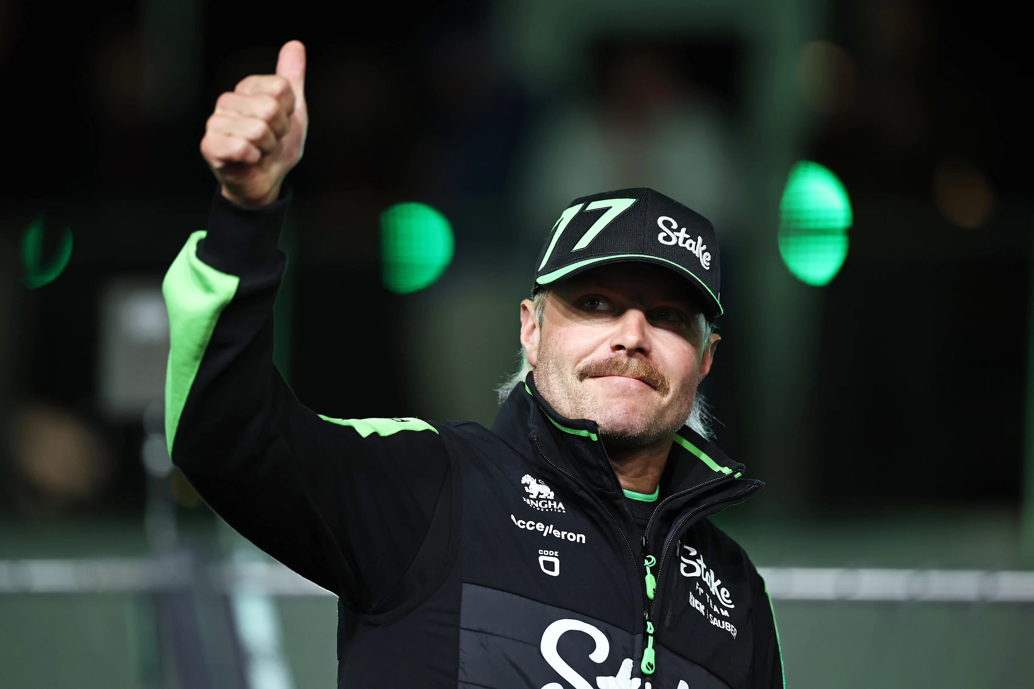 LAS VEGAS, NEVADA - NOVEMBER 23: Valtteri Bottas of Finland and Stake F1 Team Kick Sauber acknowledges the crowd on the drivers parade prior to the F1 Grand Prix of Las Vegas at Las Vegas Strip Circuit on November 23, 2024 in Las Vegas, Nevada. (Photo by Jared C. Tilton - Formula 1/Formula 1 via Getty Images)