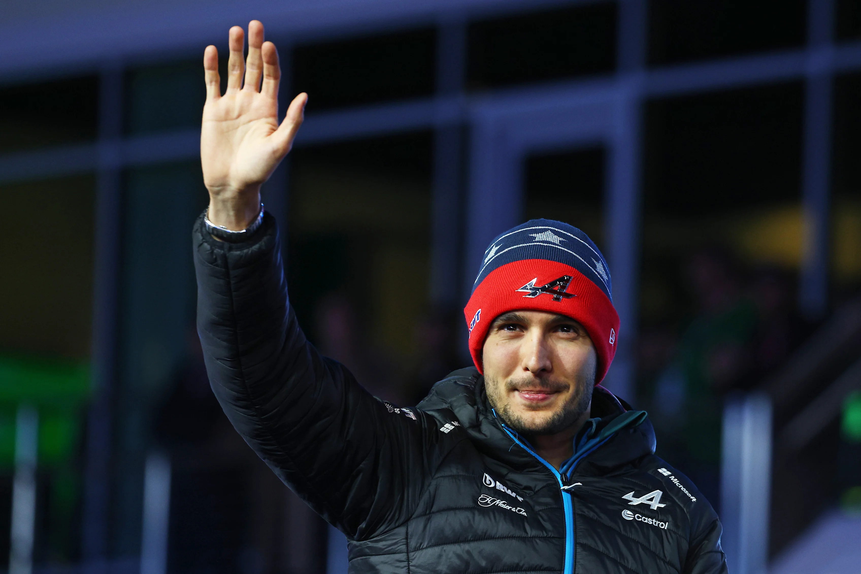 LAS VEGAS, NEVADA - NOVEMBER 23: Esteban Ocon of France and Alpine F1 waves to the crowd on the drivers parade  prior to the F1 Grand Prix of Las Vegas at Las Vegas Strip Circuit on November 23, 2024 in Las Vegas, Nevada. (Photo by Clive Rose - Formula 1/Formula 1 via Getty Images)